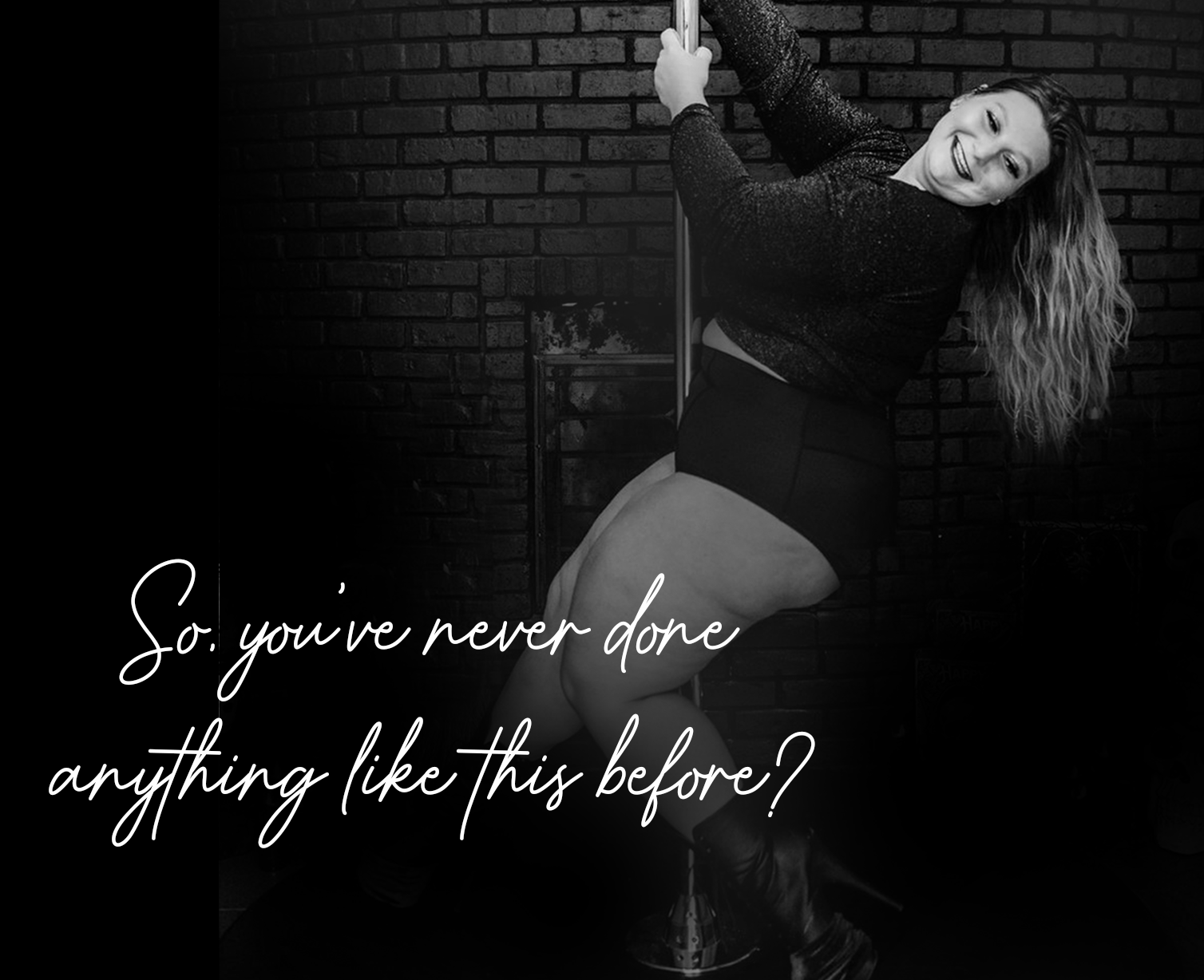 A pole dancing student smiles happily