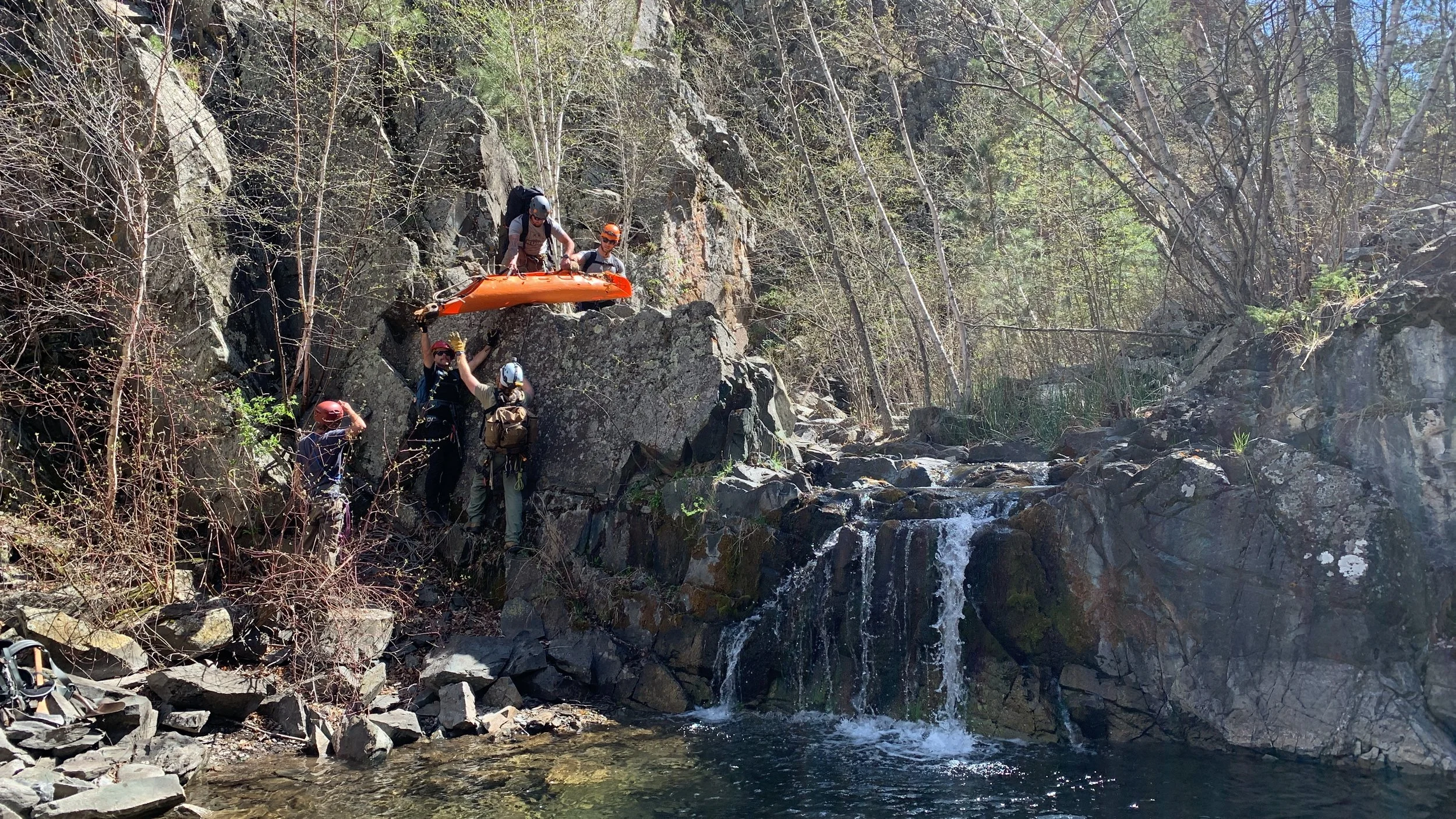 REMS team performing austere casualty evacuation