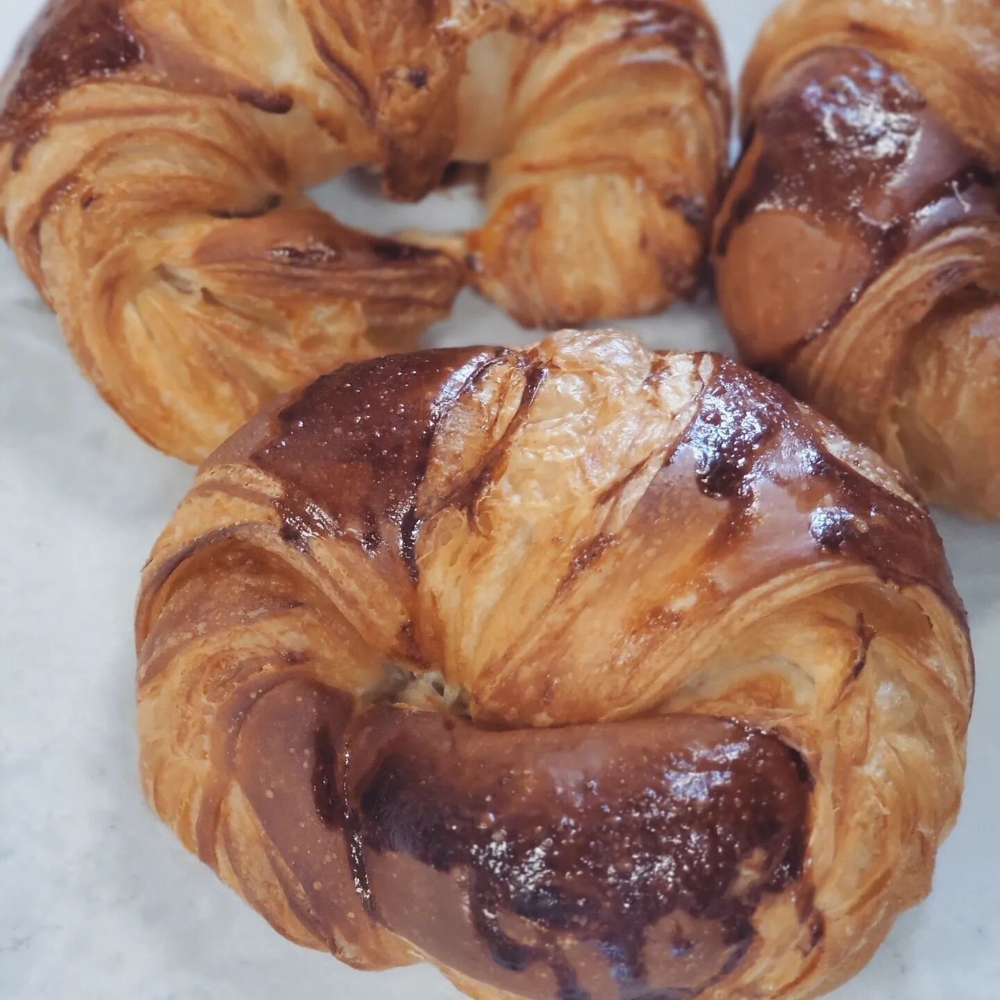 Celebrate National Croissant Day today with a flaky, buttery croissant from CocoLuxe!  We make all of our croissants in house from scratch and bake them all fresh every morning!  They go fast, so get them early!  #nationalcroissantday #retailbakersof