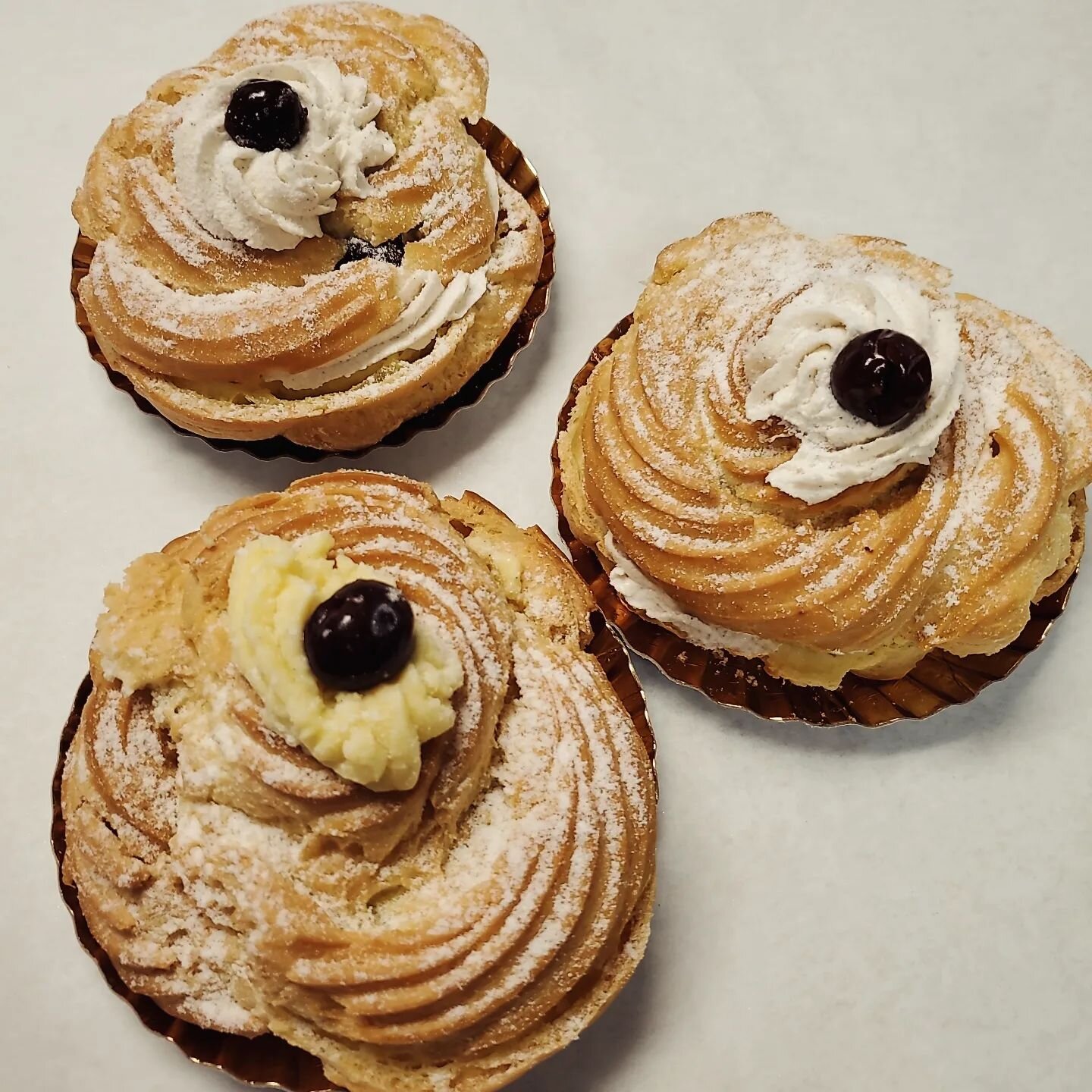 Happy St. Joseph's Day!  St. Joseph's pastries available today!  Filled with either pastry cream or sweetened ricotta cream.  Both with brandied cherries.  #stjosephsday #italianpastries #Siciliangirl #cannoli