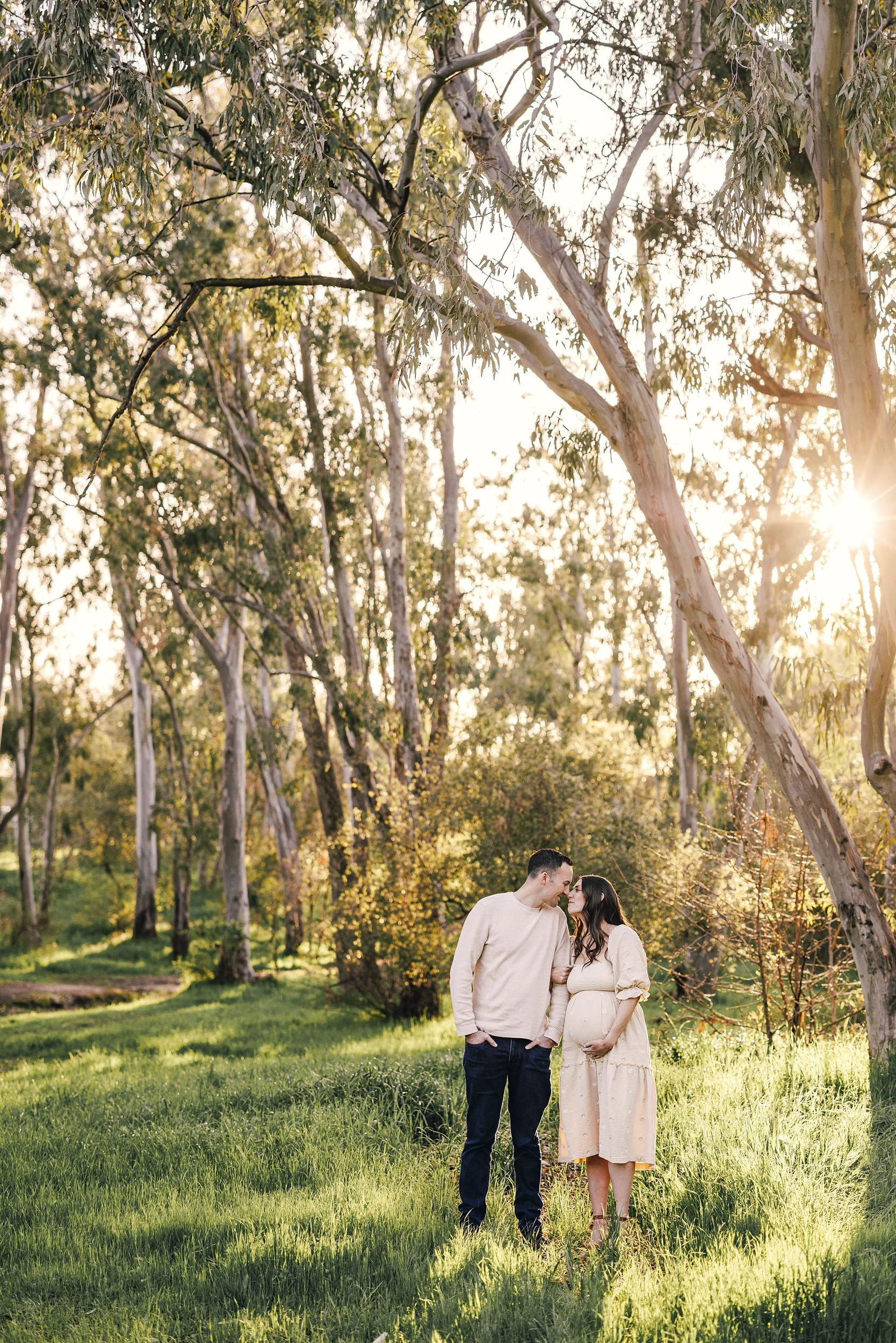 A couple gets their maternity pictures taken by Amy Wright, a Roseville maternity photographer