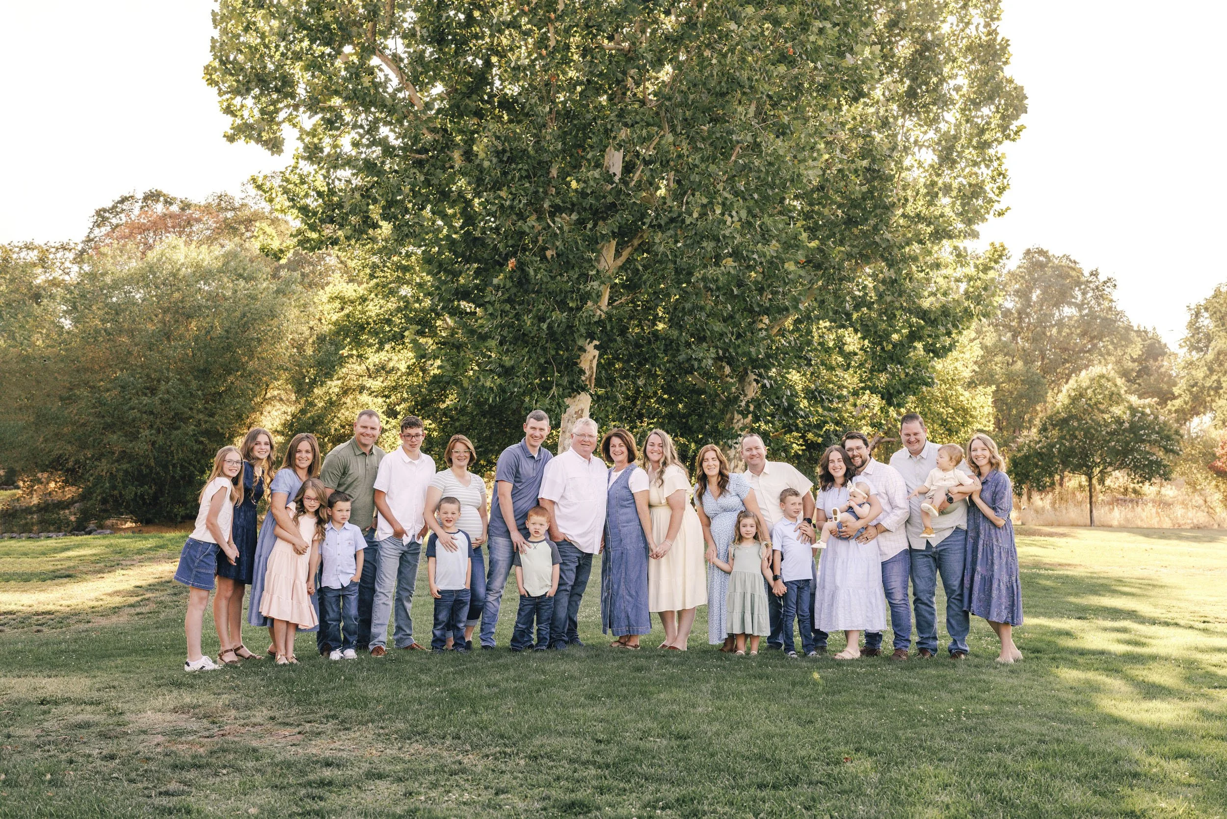 An extended family gets together for pictures in Roseville, California with photographer Amy Wright