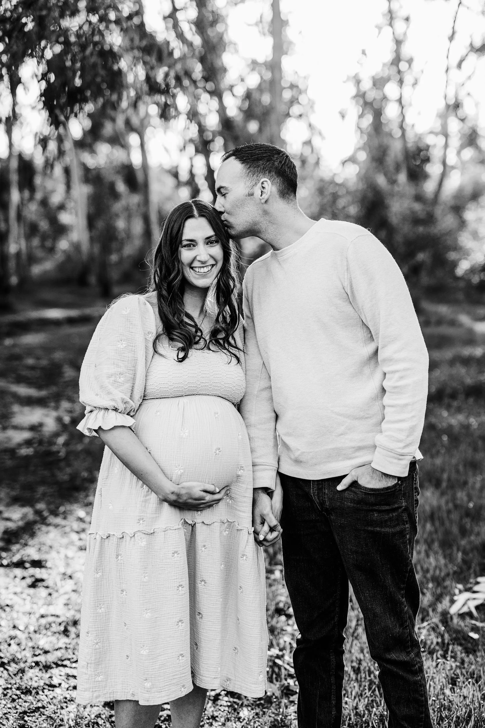 A timeless black and white photo of a couple expecting a baby, taken by Amy Wright, a Sacramento maternity photographer
