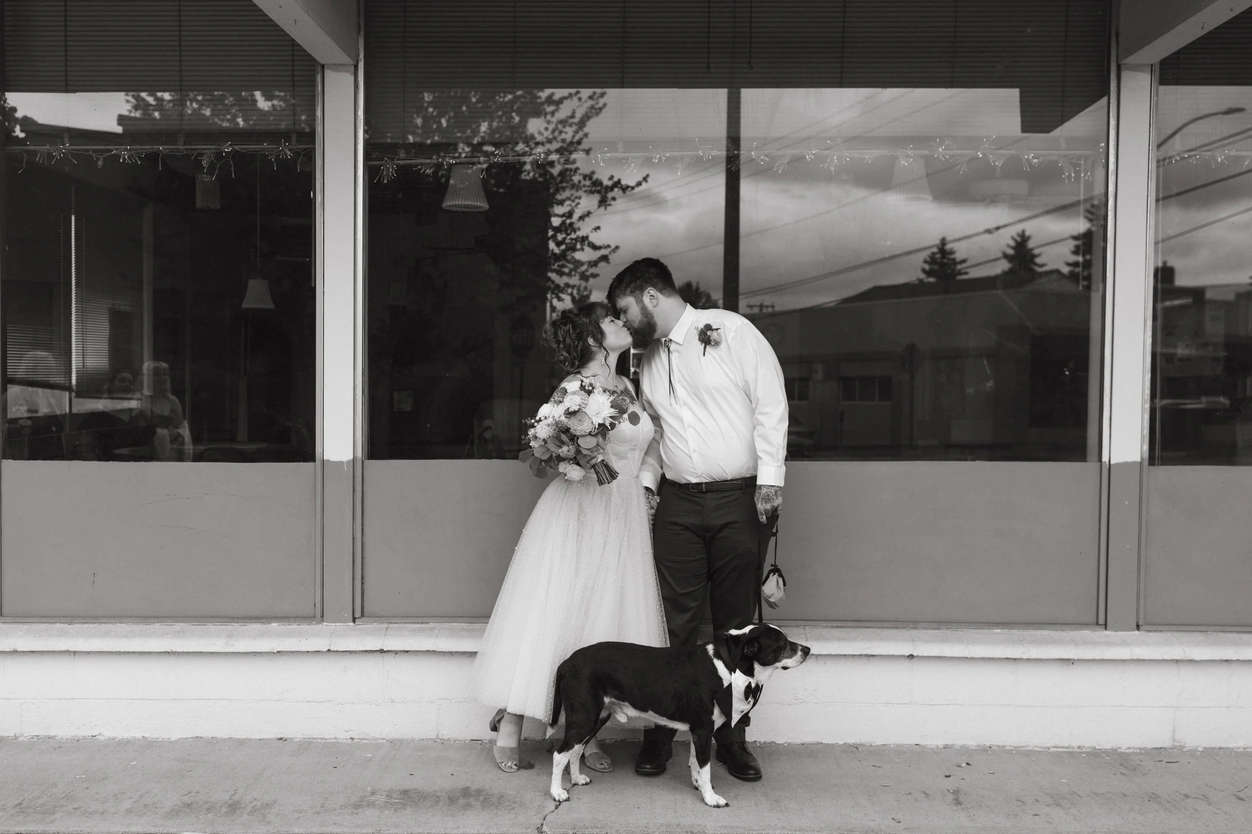 couple kissing downtown, 35mm, film photographer, candid and organic, dog in wedding, simple ceremony, microwedding, civil ceremony, seattle, whatcom, skagit photographer