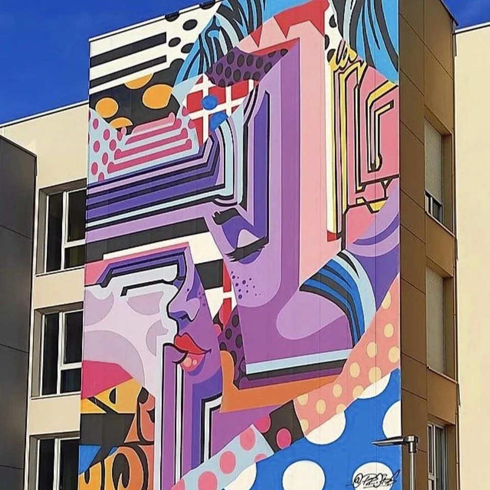 inspiring artwork, pop art wall mural, big mural on the side of a building