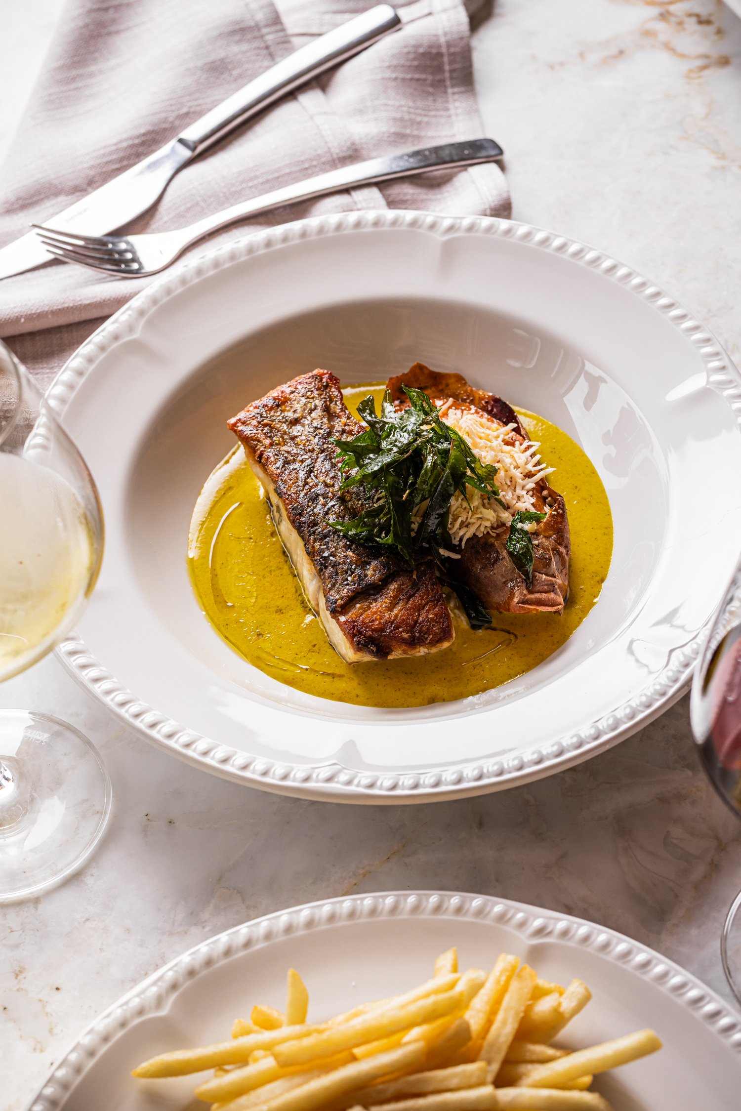 Restaurant meal of fish in a bowl