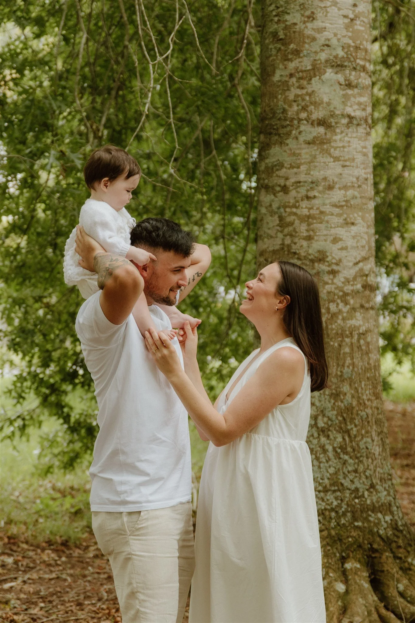 Family sitting and smiling in a lavender field