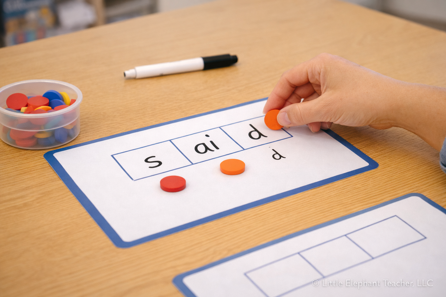 phoneme grapheme mapping mat showing the heart word said with sound boxes