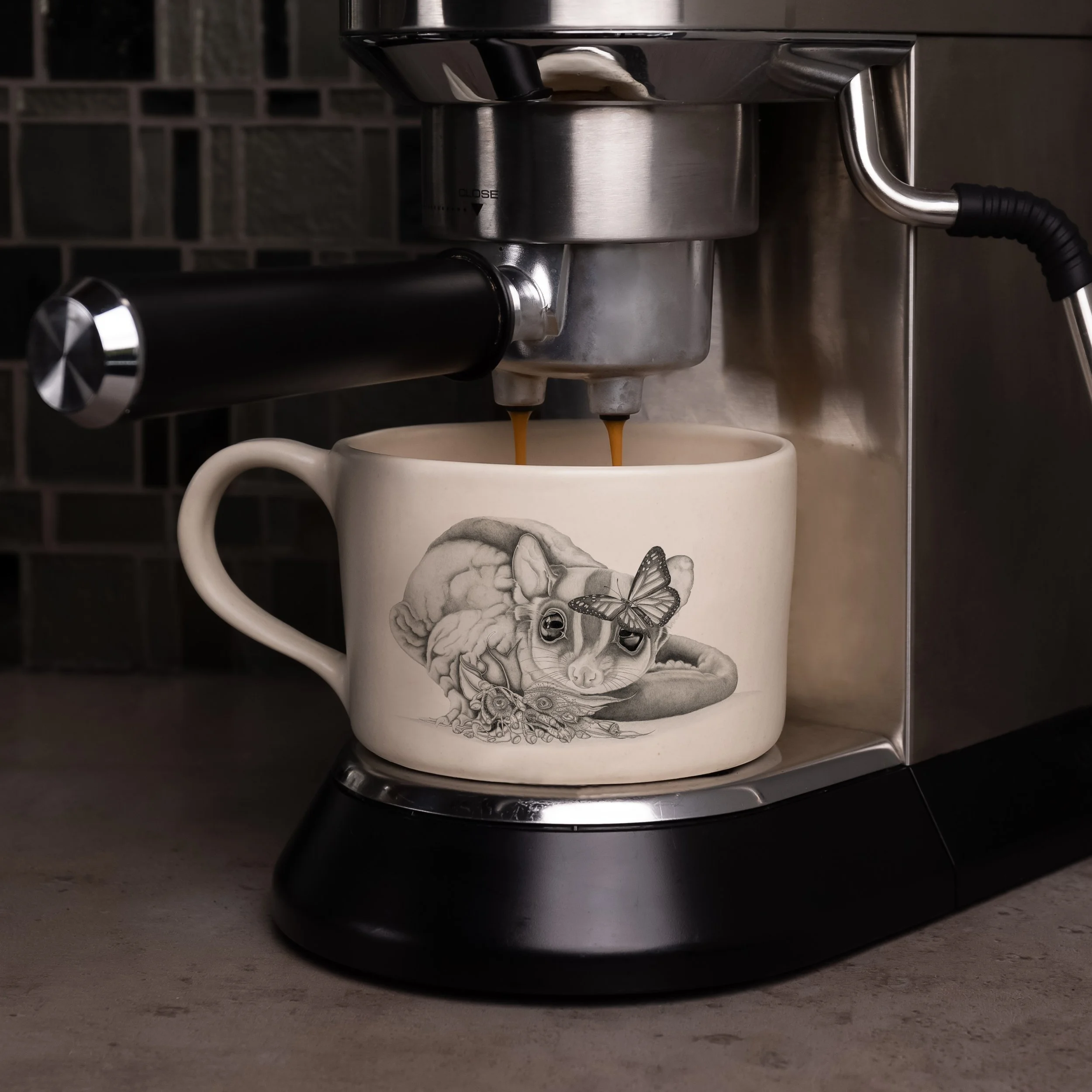 Coffee or tea mug with "Home" illustration as a decal on the handmade ceramic stoneware clay finished in ivory satin glaze, by artist Laura Luke