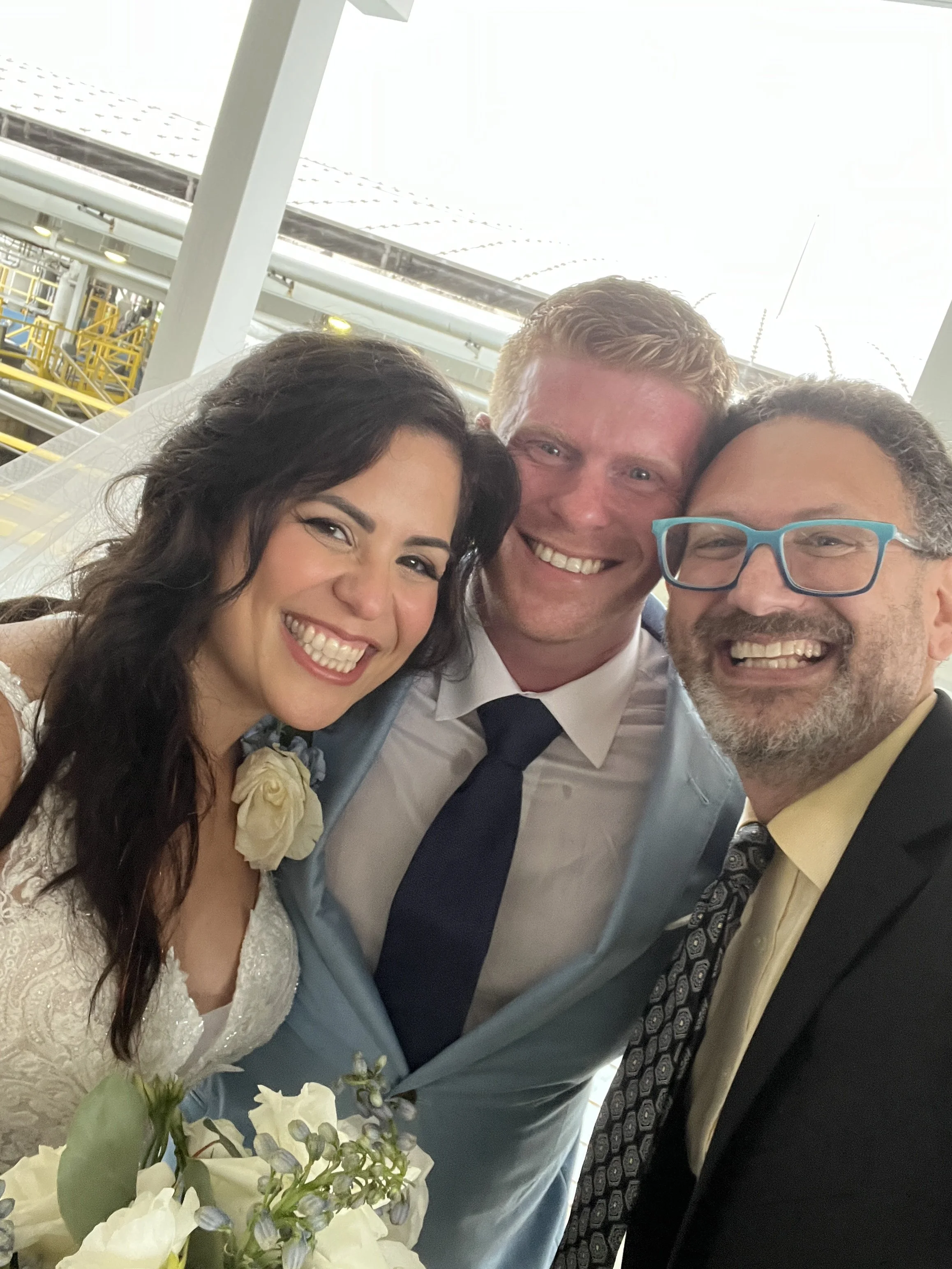 It was hot and stormy, but this beautiful couple was undeterred! What a beautiful rooftop ceremony at the Florida Aquarium!!!