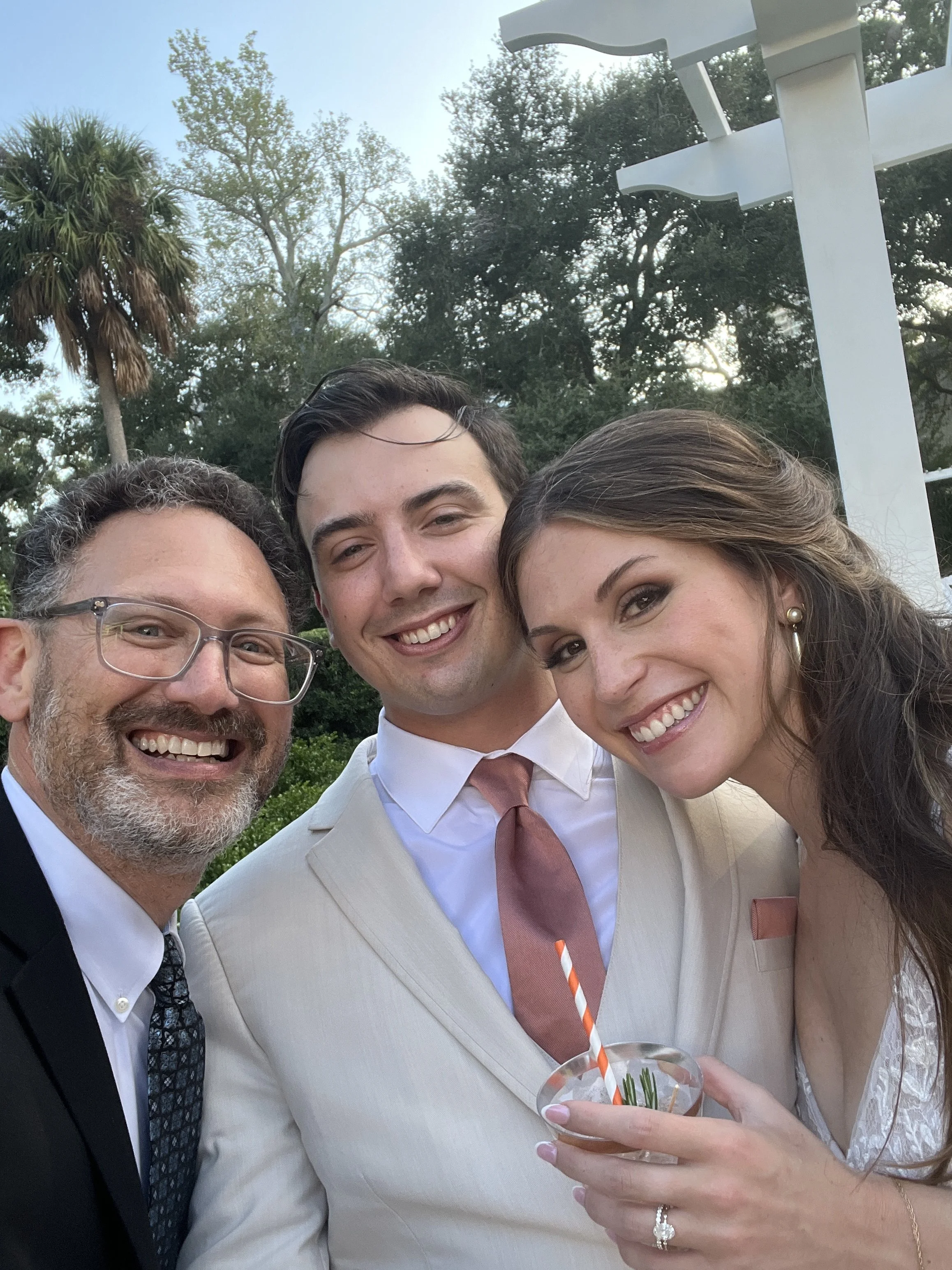 (10/10/26) A gorgeous day for this interfaith couple to express their love under the chuppah. The clouds broke just before the "I do's," and it was all smiles from start to finish at The Tampa Garden Club.