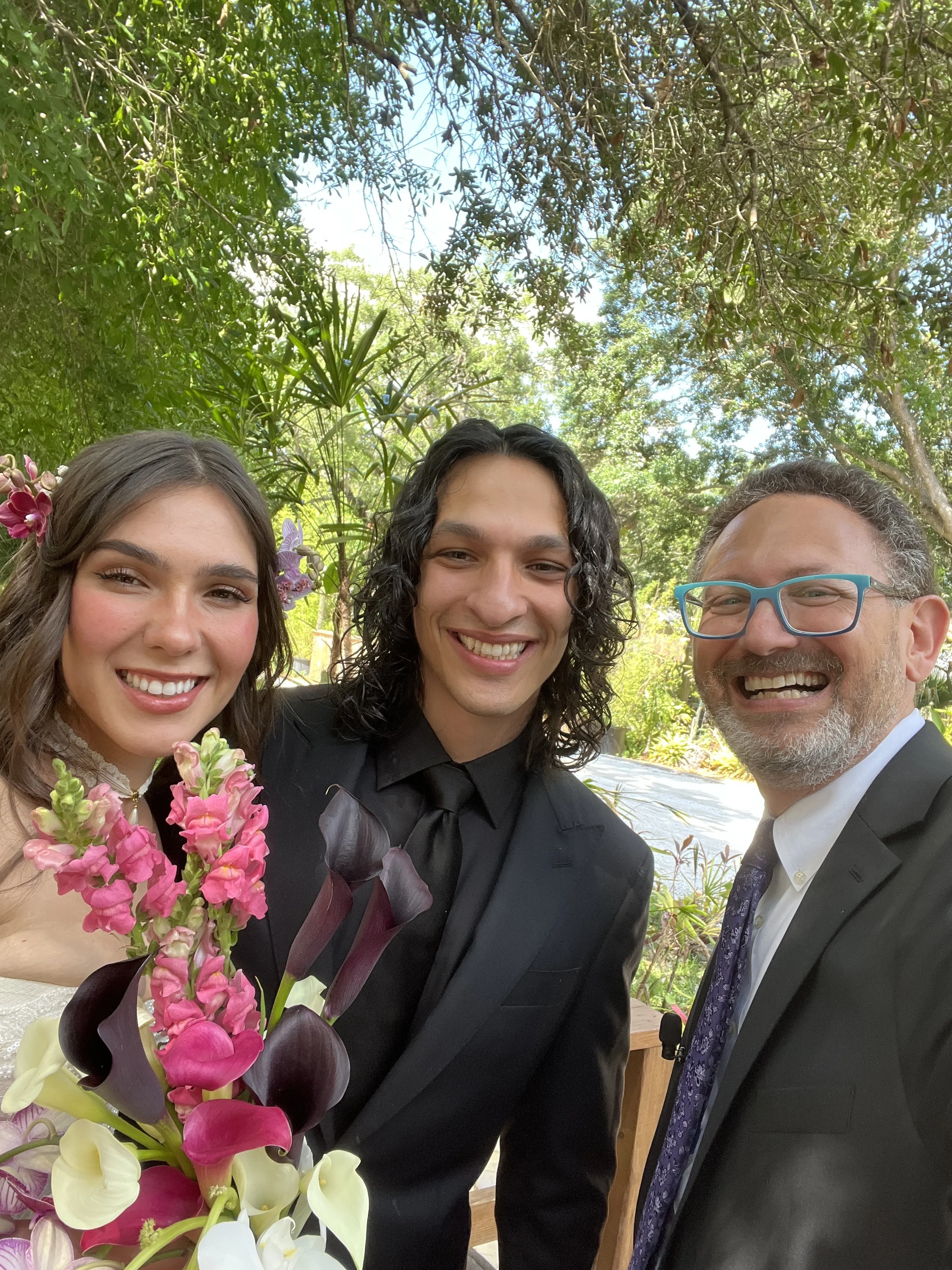 (5/3/26) This young couple was full of love and joy standing under their beautiful homemade chuppah at Del Favero Oasis in Tampa. Despite the "love bugs" flying all around, these two lovebugs were all smiles as they said "I do!"