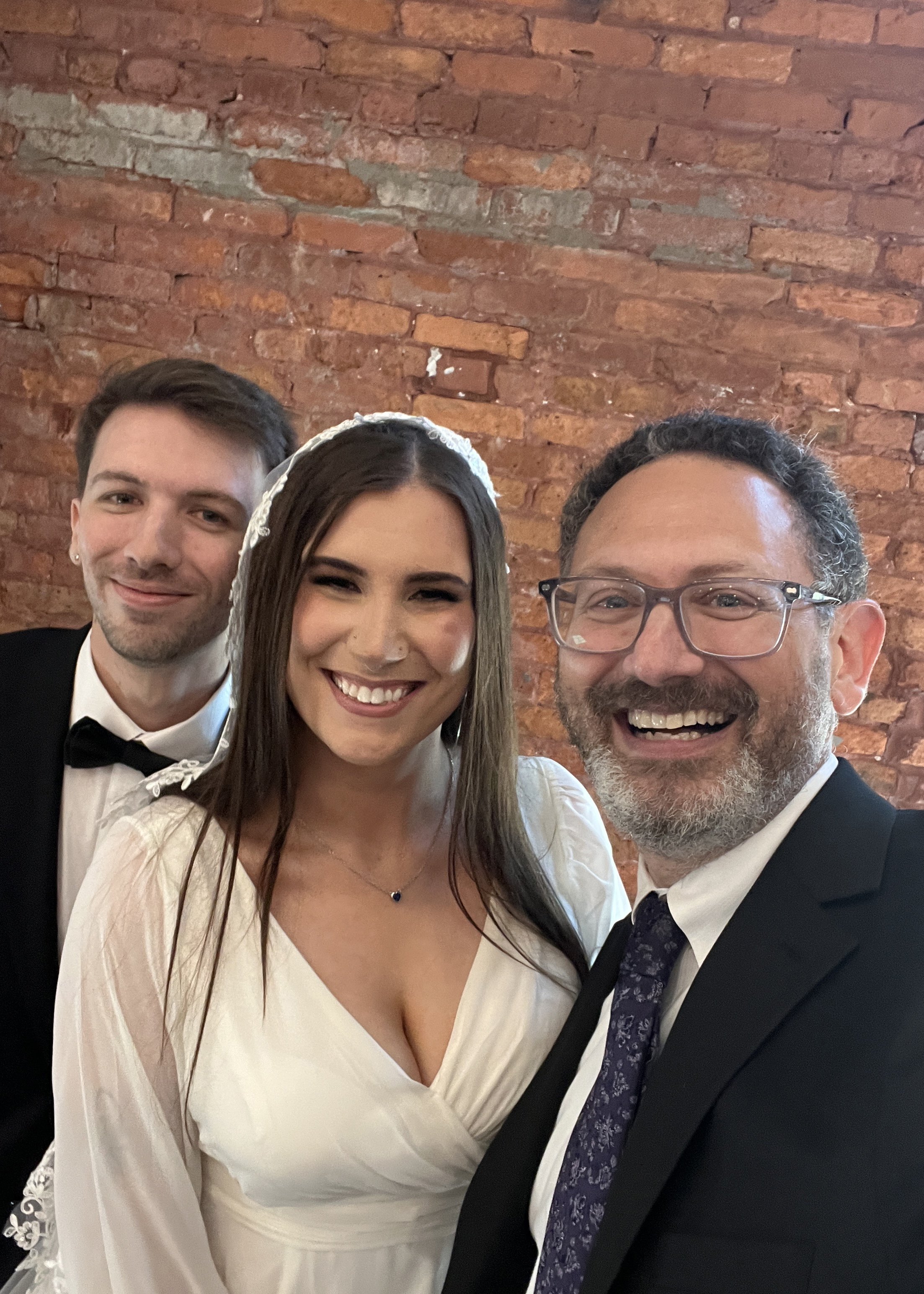 (3/14/26) Pi Day and the weekend before St. Patrick's Day made for a very special celebration for this couple at Armature Works in Tampa, FL. The love shared by their intimate gathering of loved ones was beautiful and filled the room with joy.