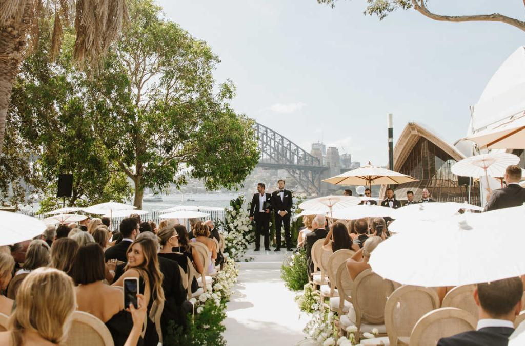 Sydney wedding ceremony overlooking the Harbour Bridge and Opera House with guests seated outdoors