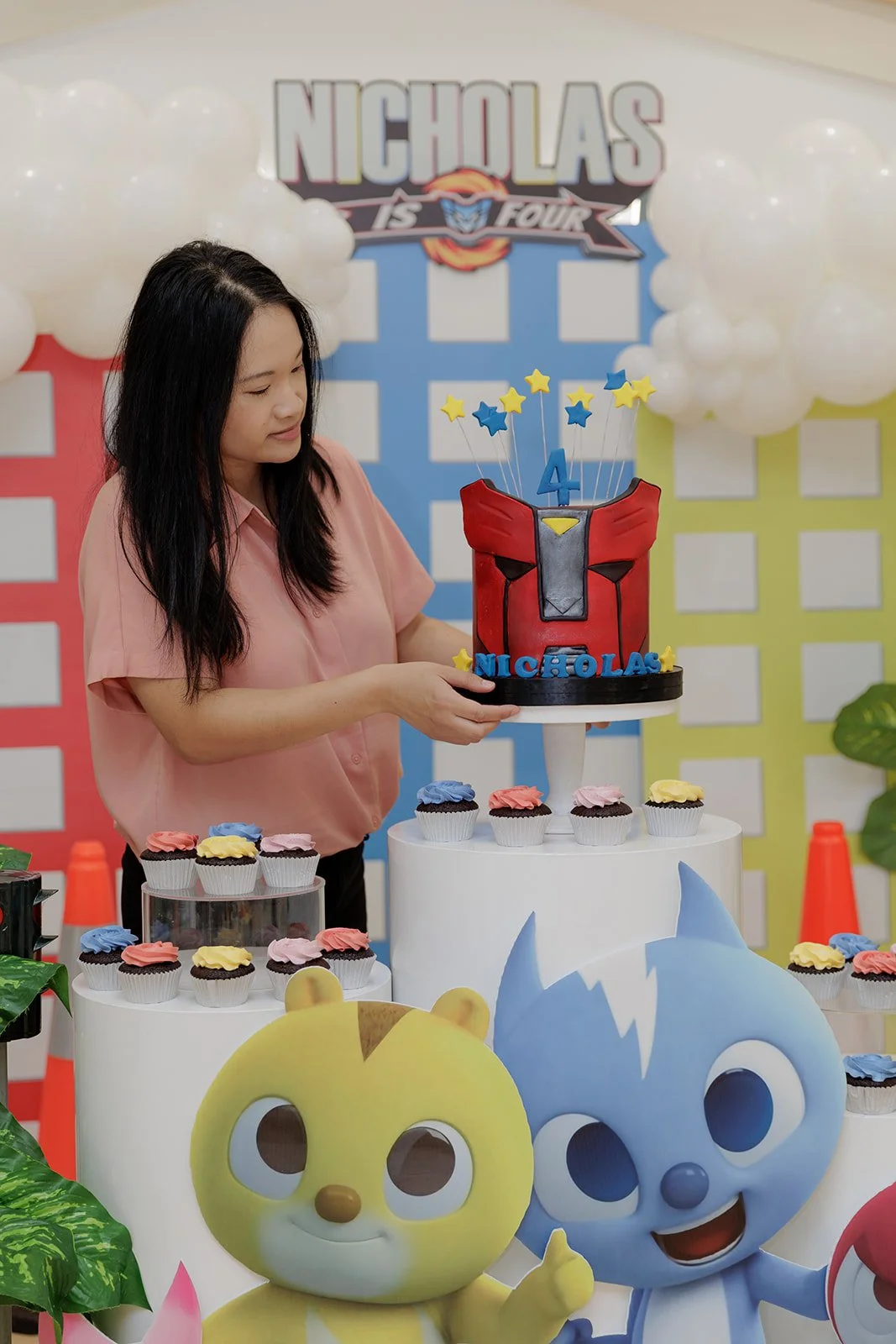 Tracey, Sydney event planner, setting up styling and table details so families can relax and enjoy their celebration.