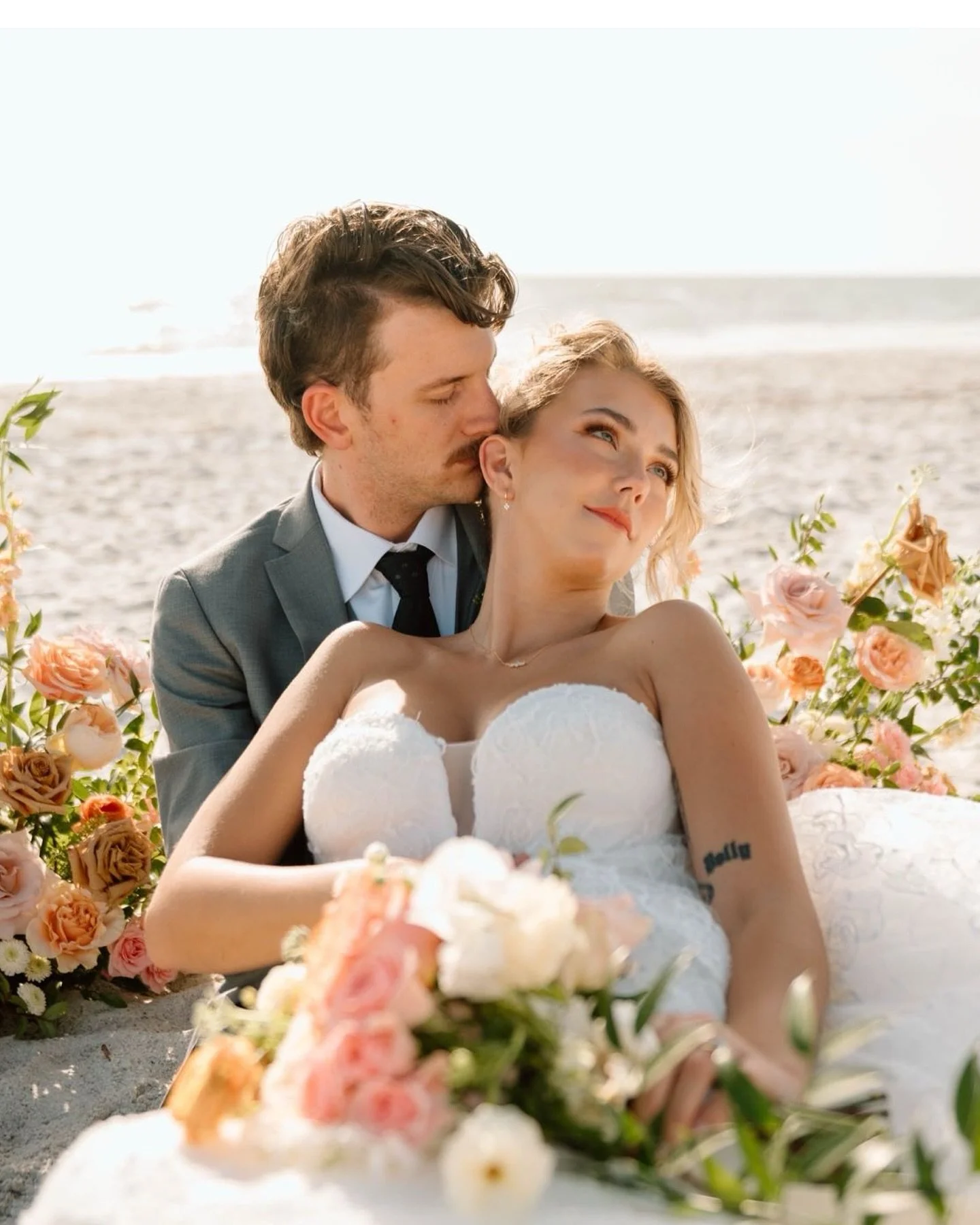 Sun-kissed vows and twirling through the sand in their beachside bliss! 💕🌊☀️

Couple: @nicoleplusalex
Dress: @ardenbridal 

#tampaweddings #beachweddingphotographer #clearwaterwedding #clearwaterweddingphotographer #stpetewedding #stpeteweddingphot