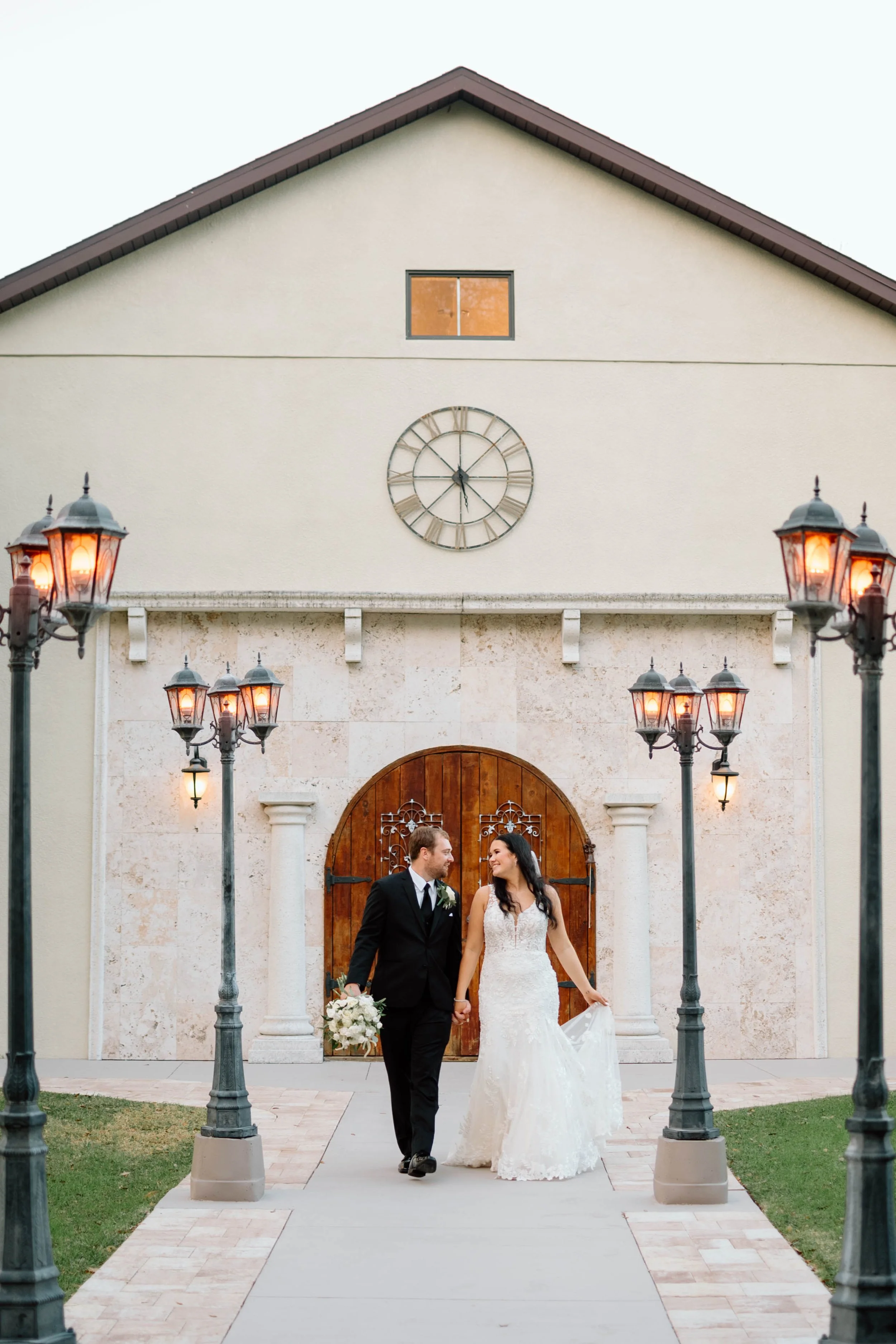 Bride and groom walking together at the venue Bakers Ranch