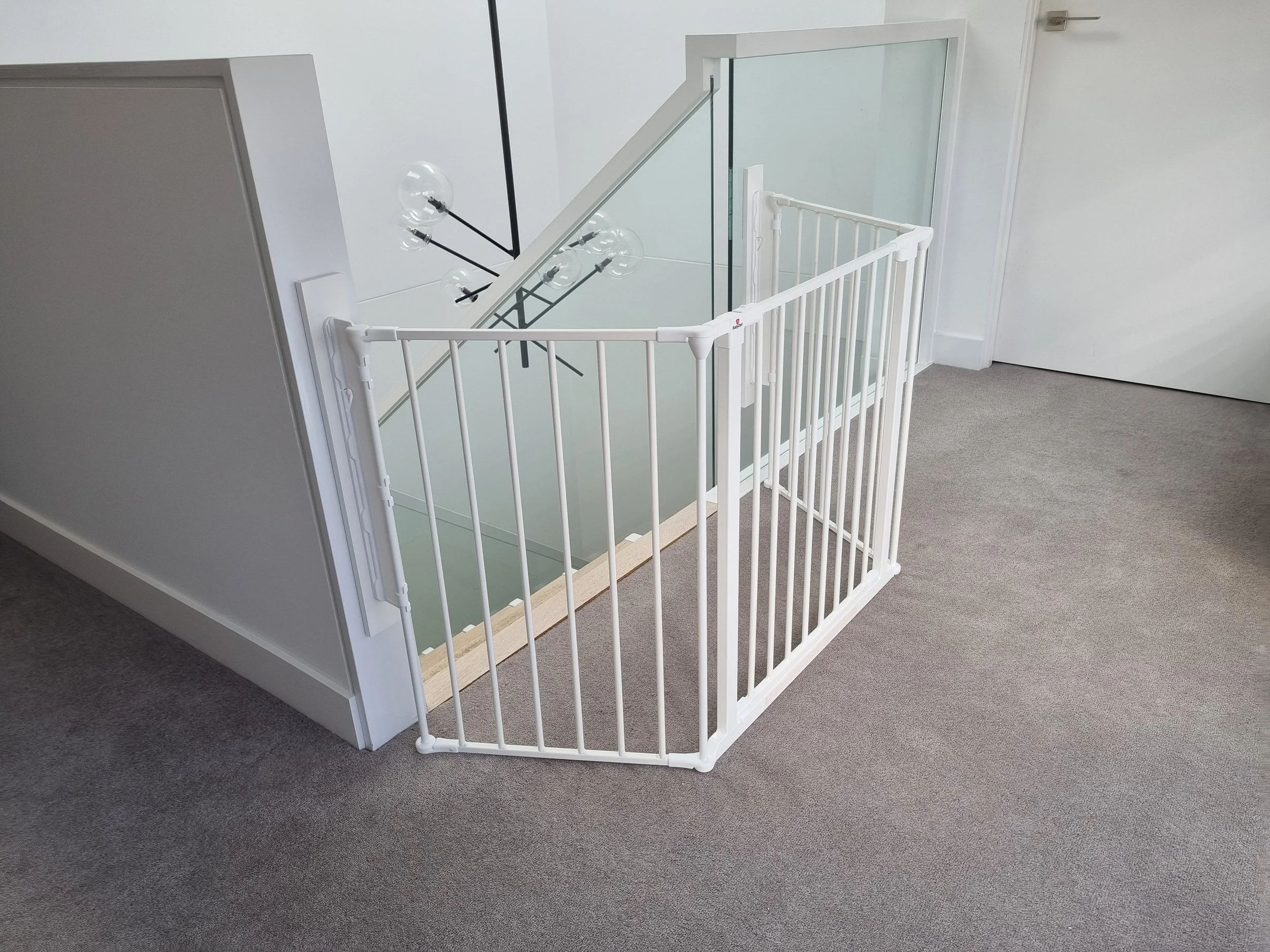 Stair top on glass balustrade