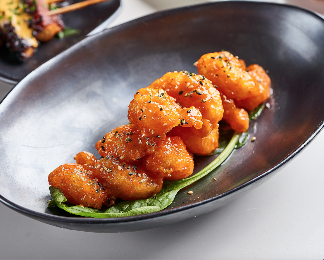  “Popcorn” Shrimp Tempura served with gochujang-yuzu aïoli.  