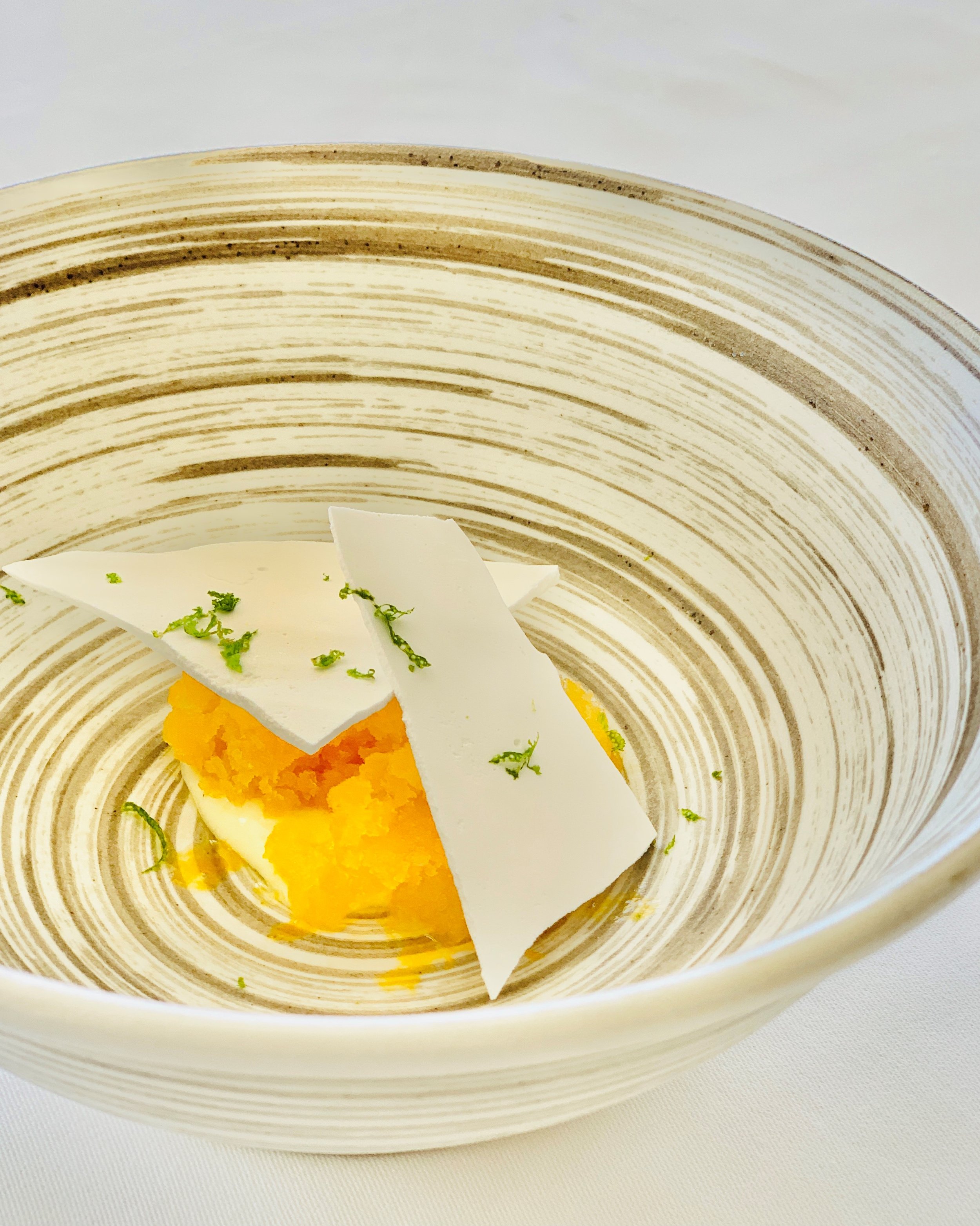  The Pavlova on The Kahala Grand Tasting menu features lilikoi granite with a crispy meringue and vanilla custard. 