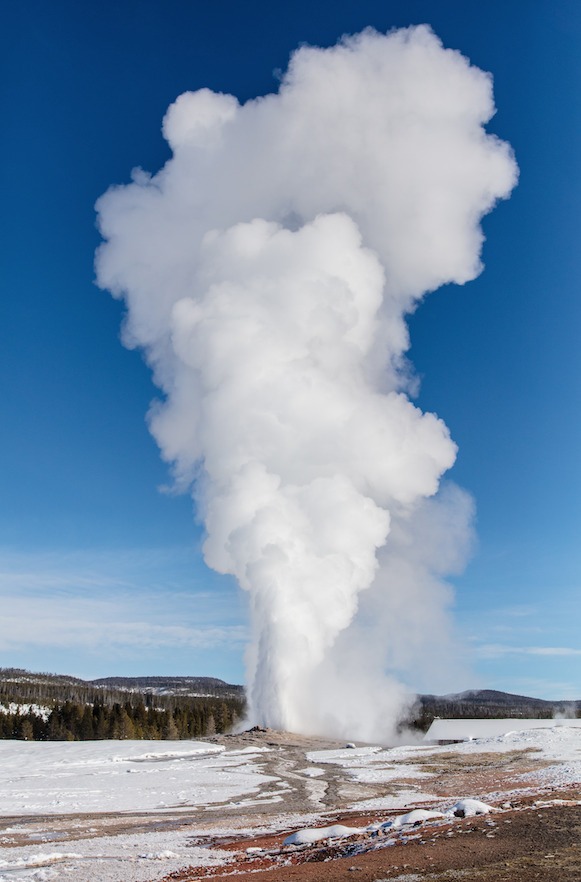  Old Faithful erupts on a clear winter day ( photo courtesy National Park Service/Jacob W. Frank ).  