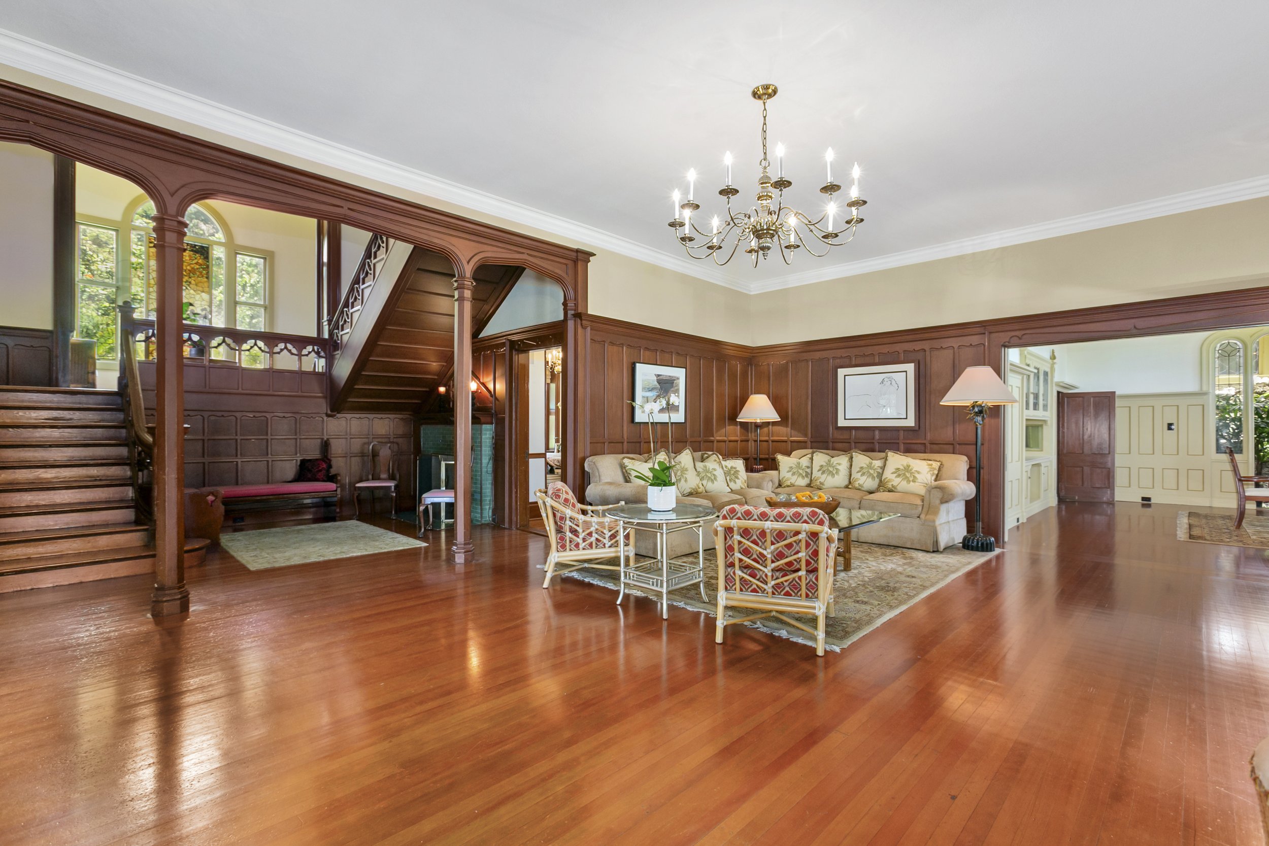  The iconic Greystone Mansion in Makiki features 6,353 square feet of living space and memorable accents, including a grand staircase, high ceilings, chandeliers, hardwood floors and Palladian windows ( photo courtesy Jose Roces ).  
