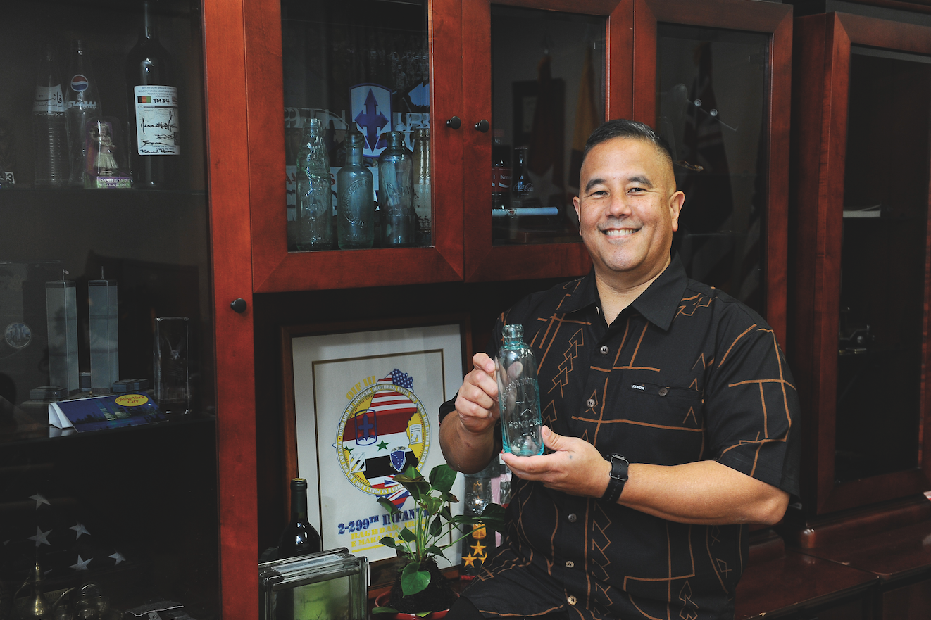  Maj. Gen. Kenneth Hara has been collecting bottles since he was a teenager in Hilo, finding an average of 20 to 30 bottles a year in the first five to eight or so years of his hobby.  Photo by Lawrence Tabudlo   
