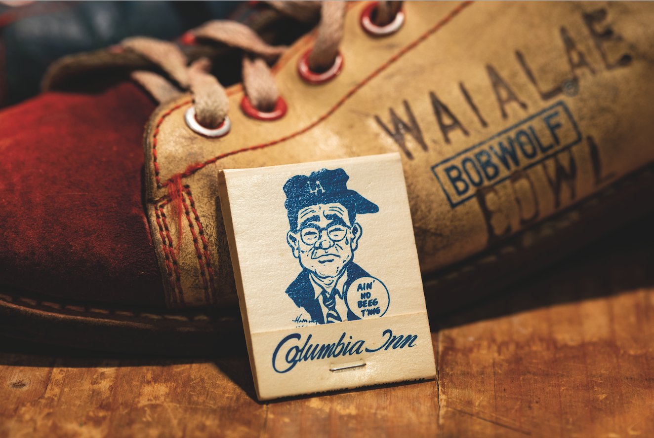  Columbia Inn’s matchbook features an illustration of owner Fred Toshio Kaneshiro created by  Honolulu Advertiser  cartoonist and Columbia Inn regular Harry Lyons.  Photos by Adam Jung  