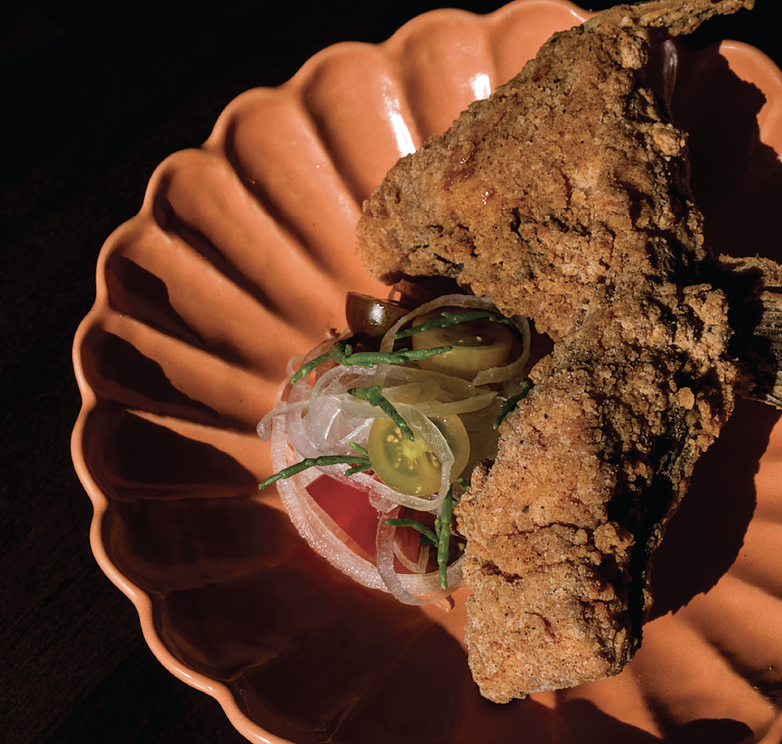  The hamachi kama, battered along the lines of Southern fried chicken, is given a dose of acidity through a captivating finadene.  