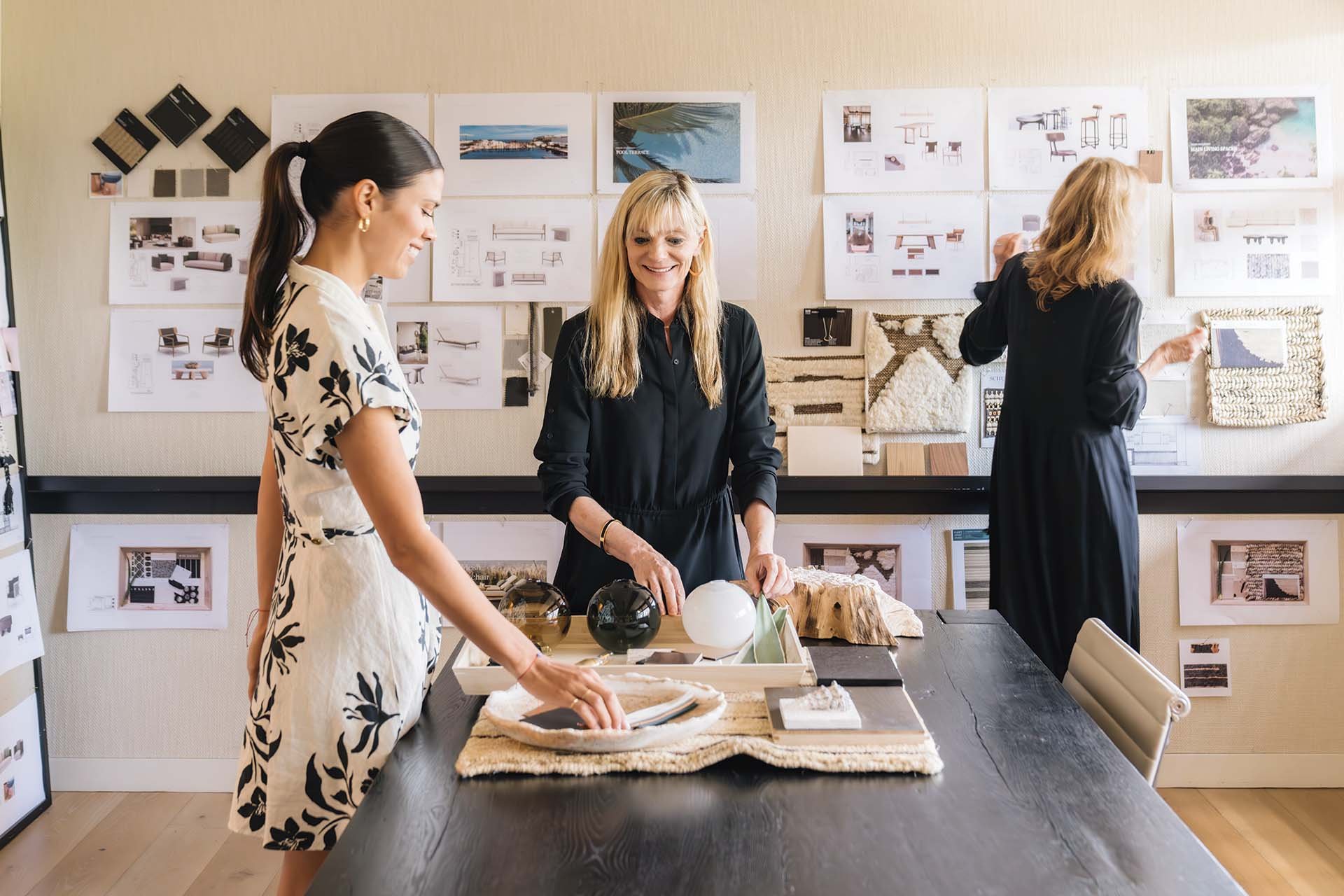  9:00 a.m.  Office huddle, Philpotts Interiors 