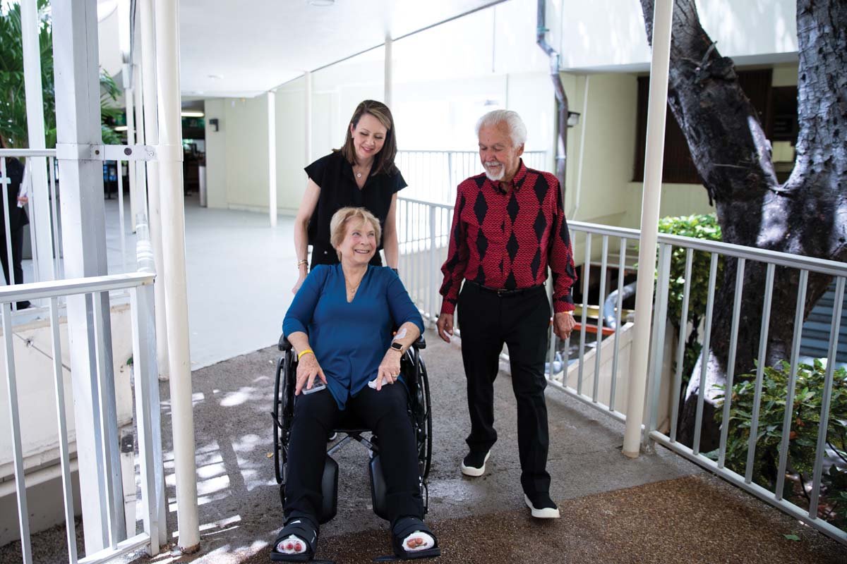  Straub Burn Unit coordinator Amy Chong, RN, (in back) with Kula patient Judy McCorkle and her husband, Tom Reed.&nbsp;   Photo courtesy Hawaii Pacific Health  