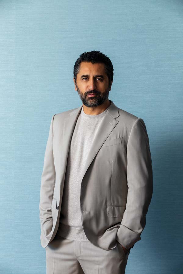  On Cliff Curtis:  ZEGNA  solid twill suit in medium brown $3,990; NEIMAN MARCUS cashmere sweater $295, both available at NEIMAN MARCUS Ala Moana Center.  