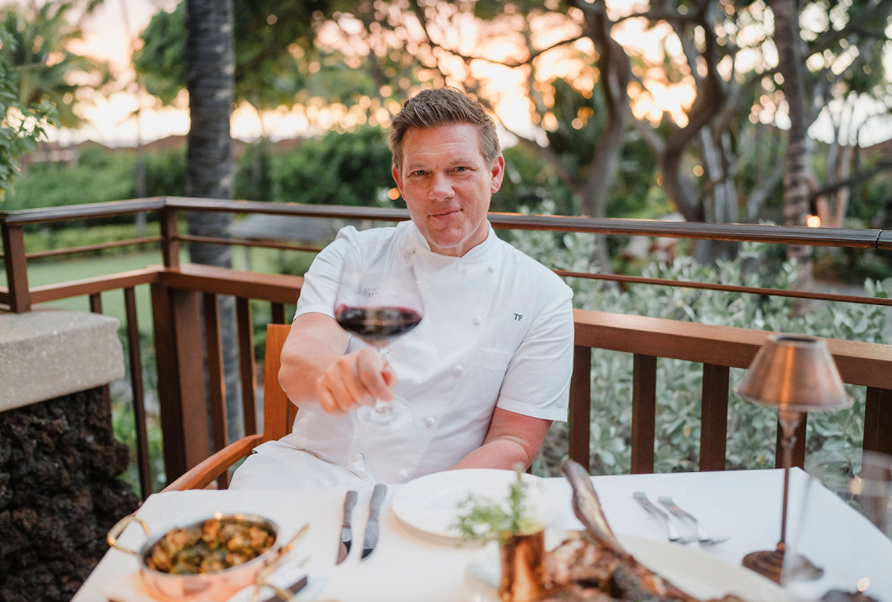  Florence makes a toast to his Hawai‘i pop-up evolving into a permanent dining venue at the Four Seasons.   Photo courtesy Four Seasons Hualalai  