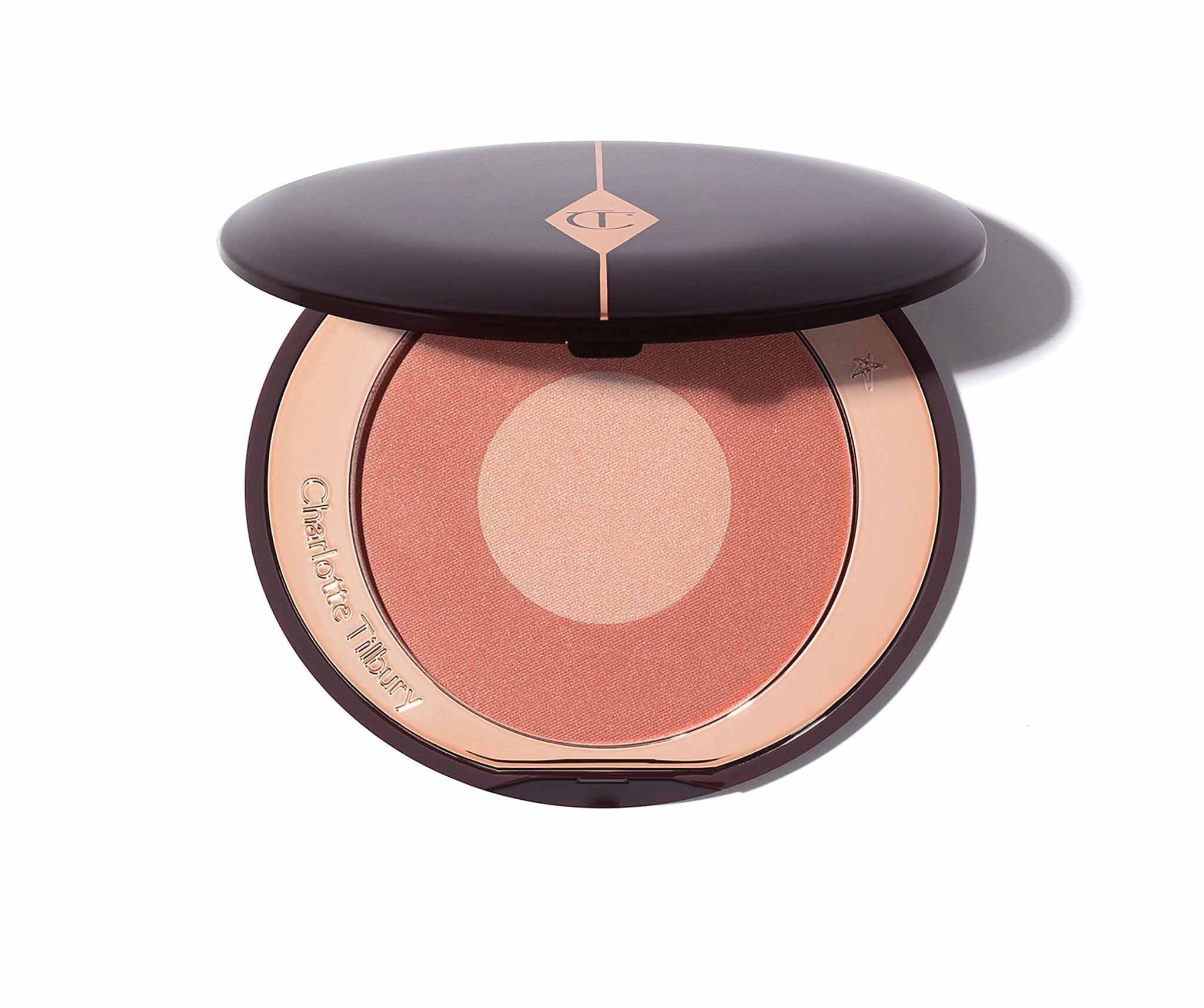   CHARLOTTE TILBURY  Cheek to Chic Blush  $42 at    charlottetilbury.com   
