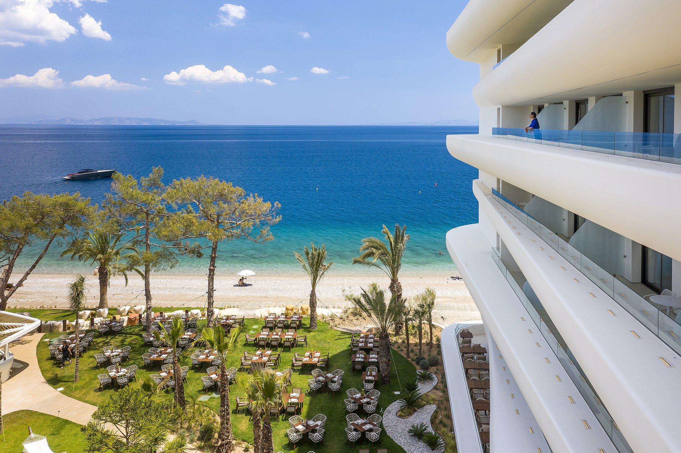 Isla-Brown-Corinthia-Drone-day-view-girl-on-balcony.jpg