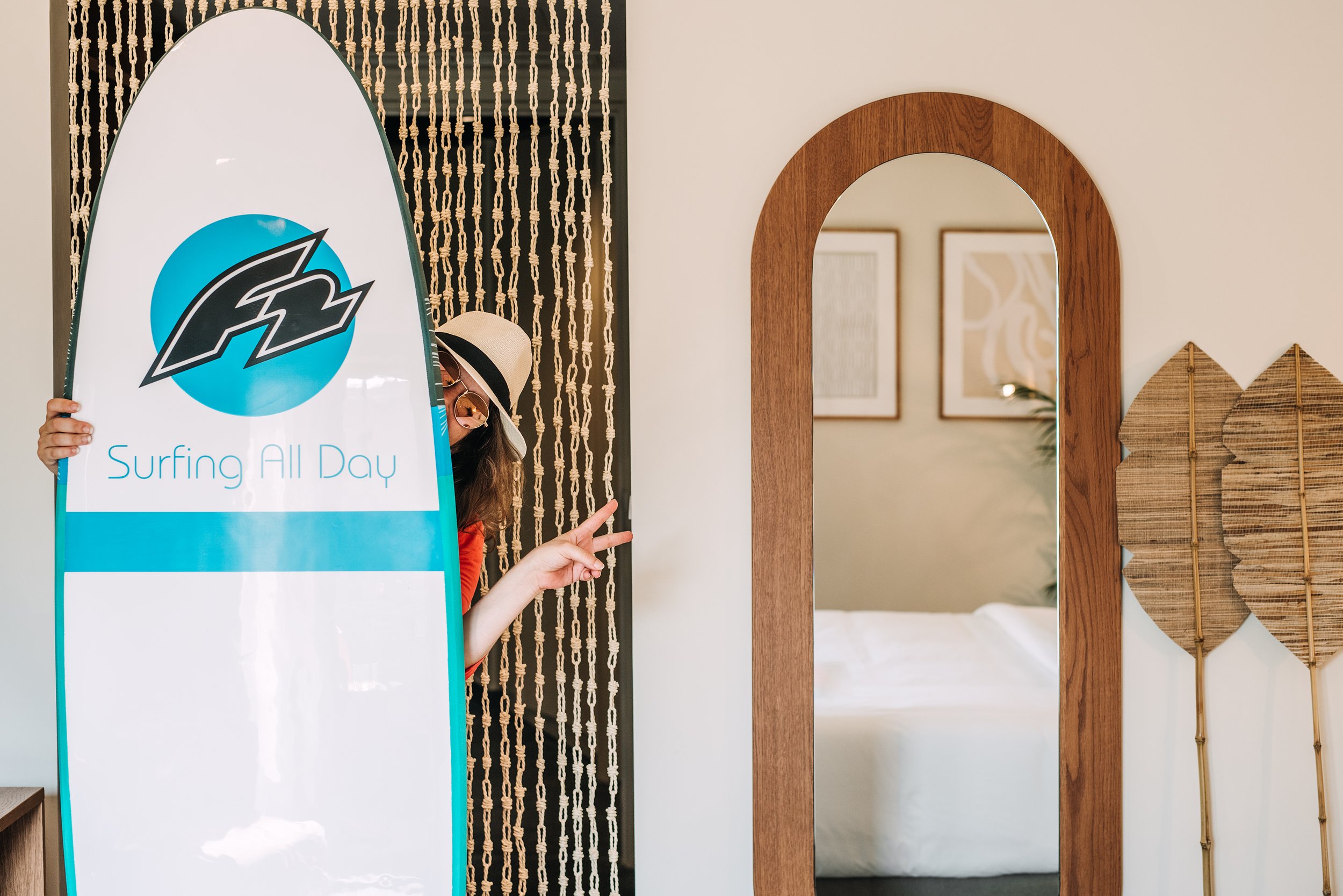 DAVE-by-the-beach-Loutraki-by-Brown-Hotels-Guest-with-surf-board.jpg