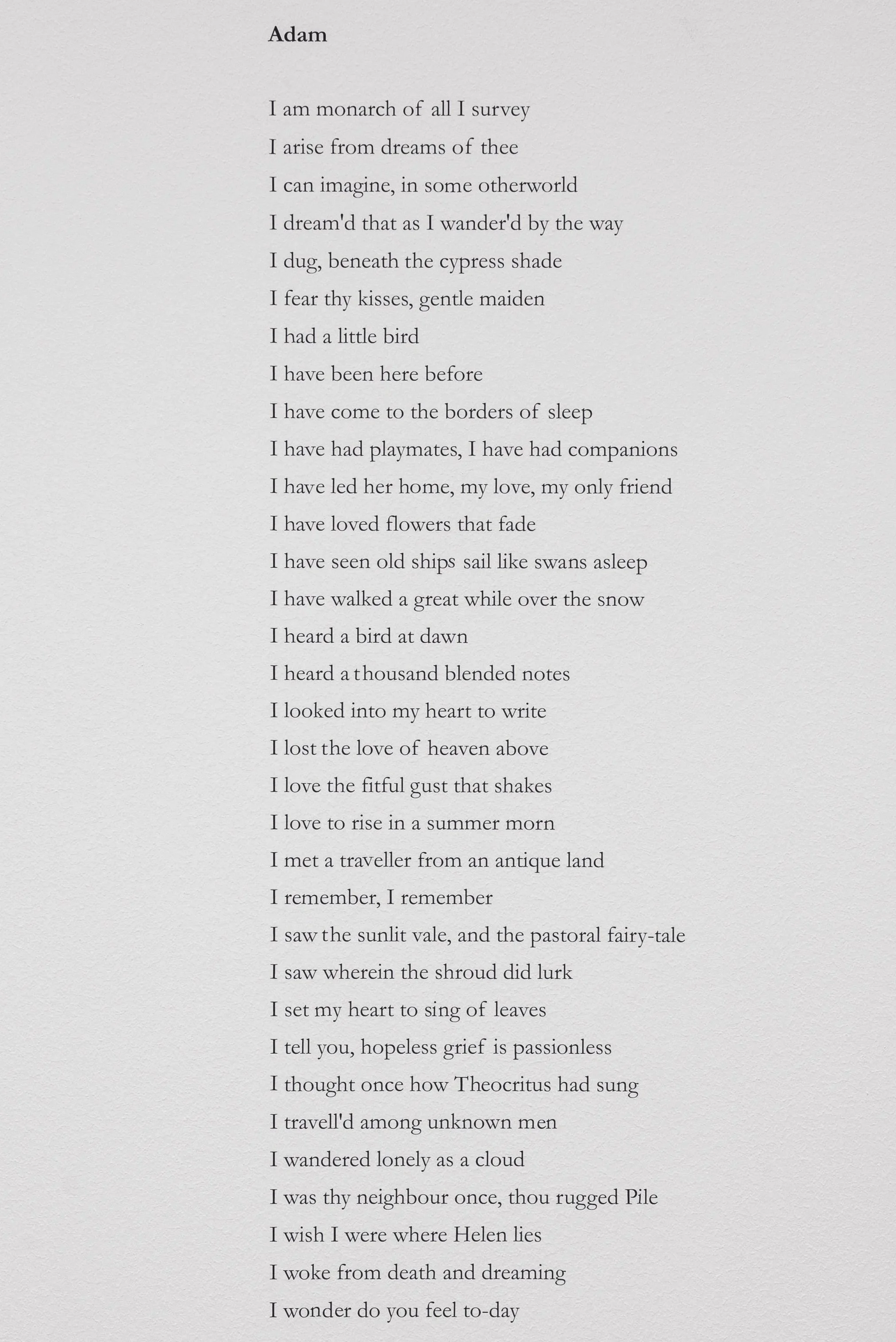 Poem titled 'Adam' printed on white paper, with the verses centered and evenly spaced.