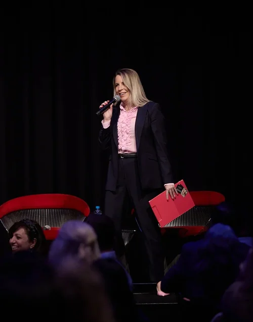 Olympia Kwitowski delivering her signature keynote on stage