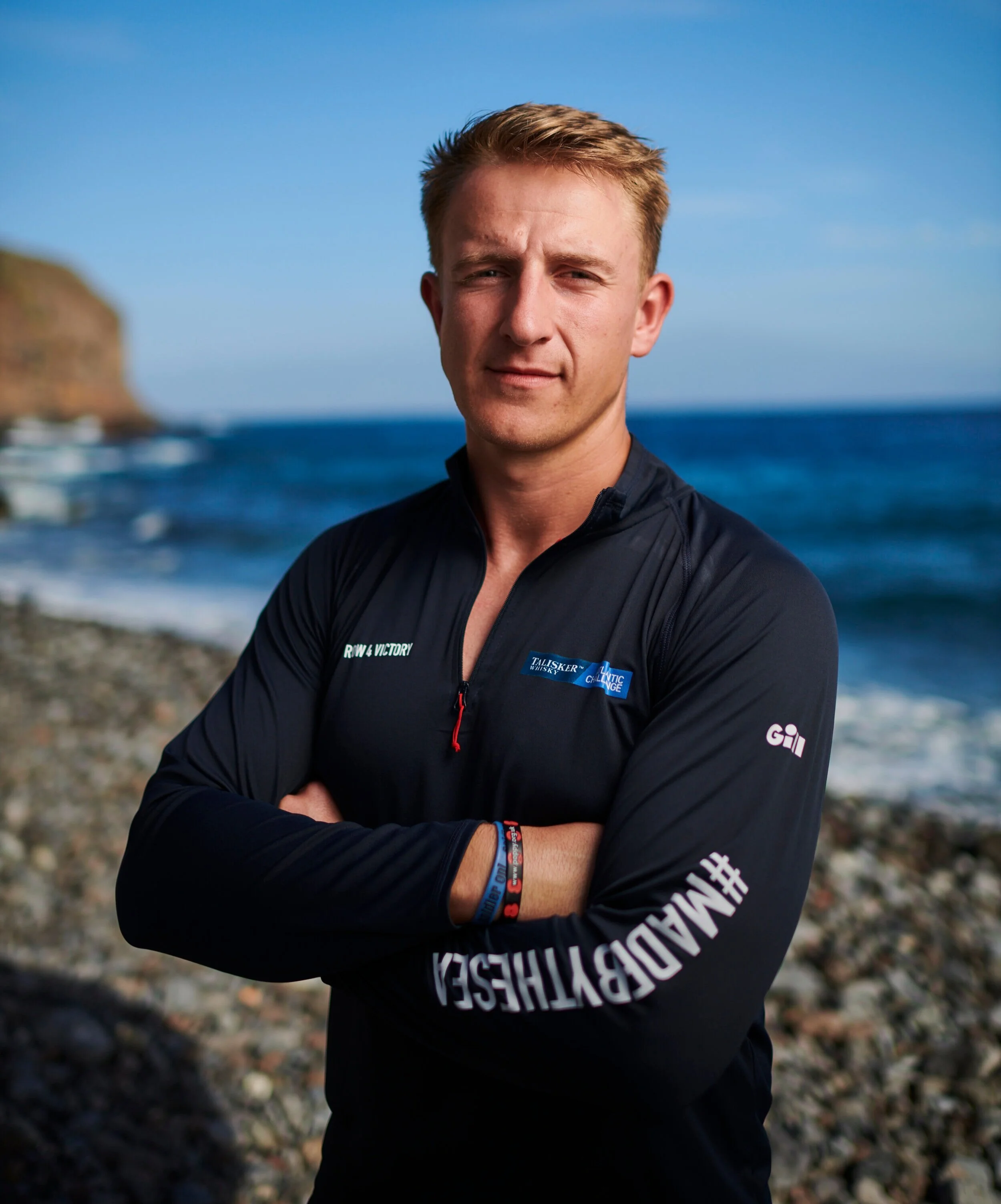 Duncan Roy, Ocean Rowing Coach standing next to the ocean