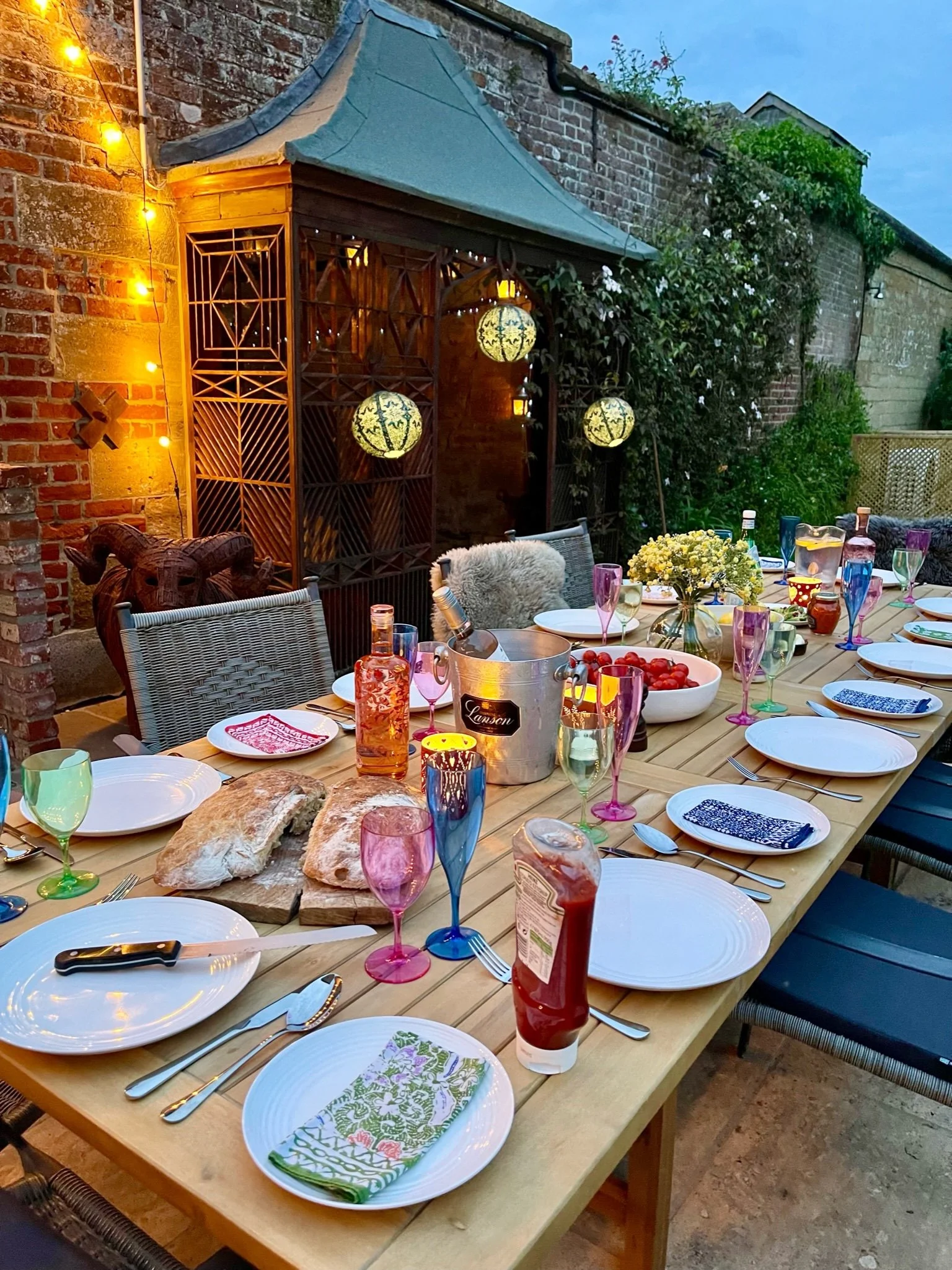 Bridge House bbq terrace set up for celebration multigenerational dinner