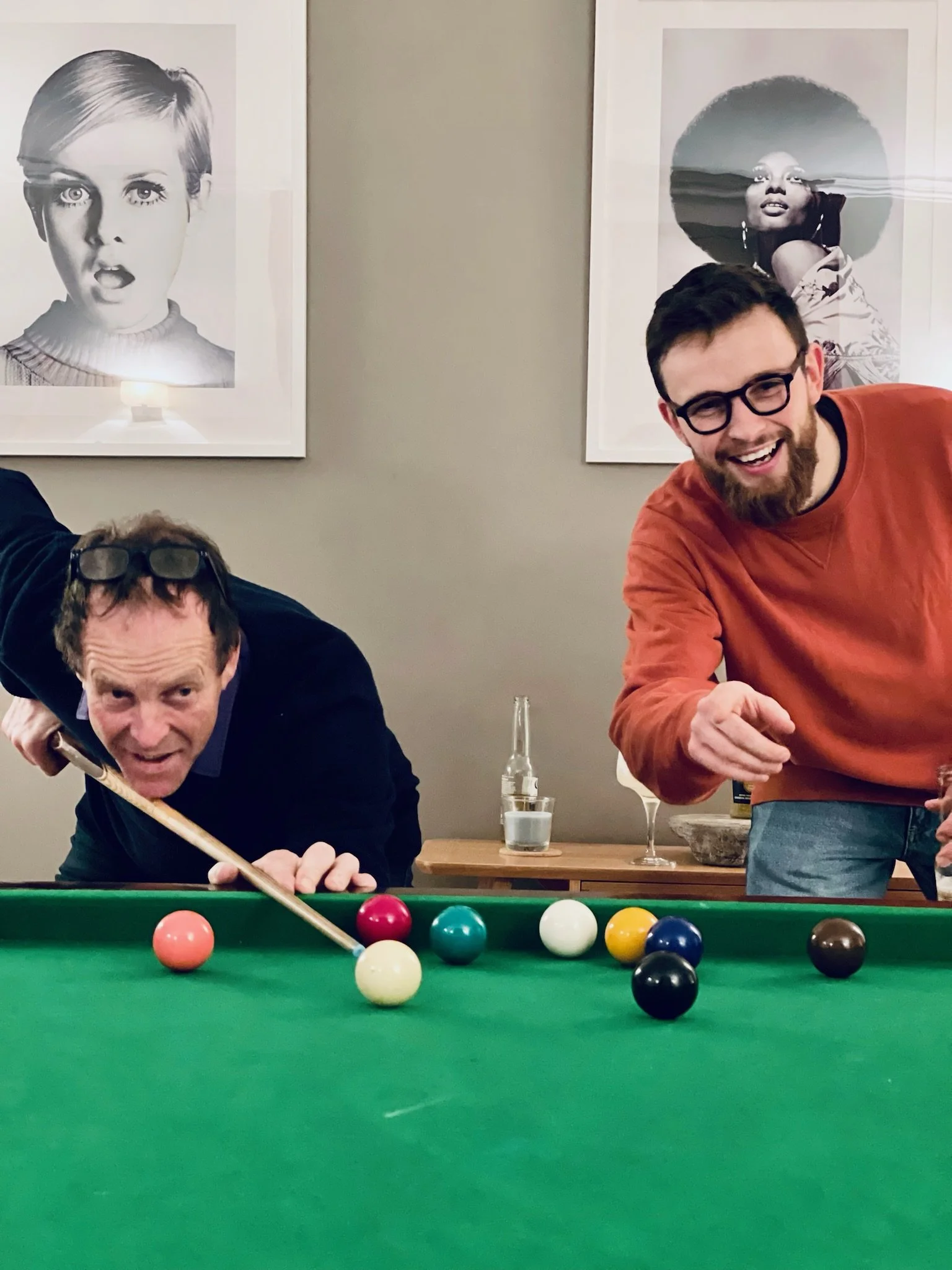 Bridge House father and son relaxing playing snooker