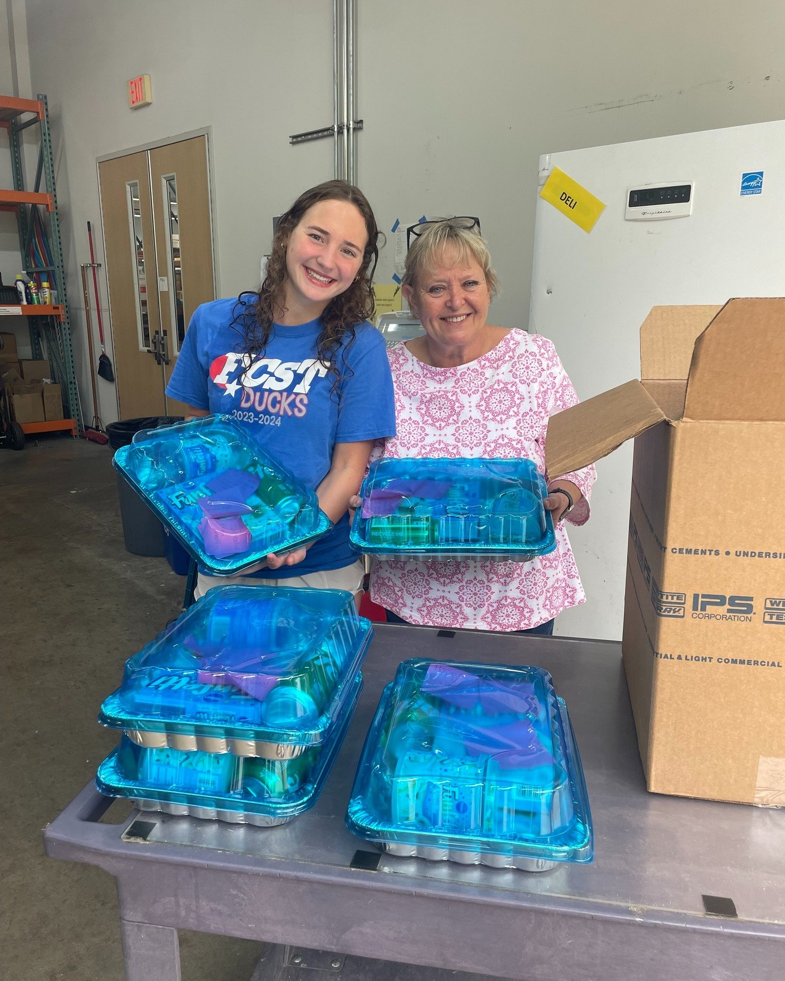 Erin received money from St. Laurence Knights of Columbus with the directive to do something good for the community. She chose these fun birthday cake boxes and translated the instructions to Spanish in the event the recipient doesn't speak English. 