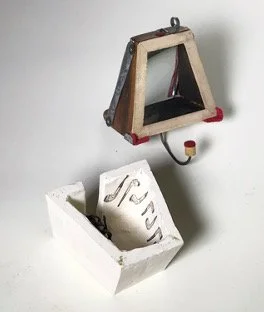 "F.A.B." (top view) by John T. Upchurch and Rebekka Federle (top view), 3" x 4" x 4", Ceramic, wood, antique print material, sheet metal, steel wire, felt, found objects