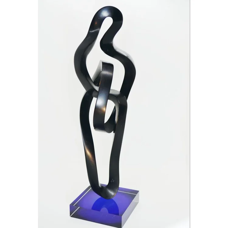 Tomas Co, "Tete-a-Tete", Marble sculpture
5 x 2-1/2 x 3-1/2 in.