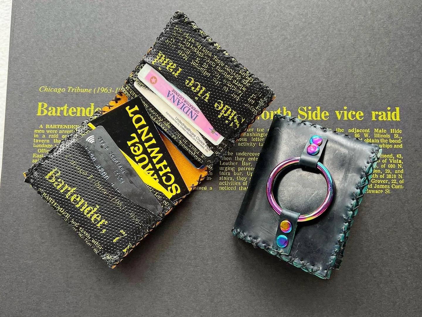 Samuel Schwindt, "Bondage Wallets", Leather and steel rings, 7 x 3-1/4n x 3/4 in.