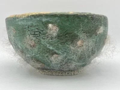 "Lull" (side view) by Bethany Cordero, 5.5"x 5.5"x 3", Glazed ceramics, wool textile and woven sterling silver wire