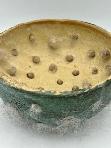 "Lull" (top view) by Bethany Cordero, 5.5"x 5.5"x 3", Glazed ceramics, wool textile and woven sterling silver wire