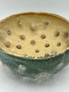 "Lull" (top view) by Bethany Cordero, 5.5"x 5.5"x 3", Glazed ceramics, wool textile and woven sterling silver wire