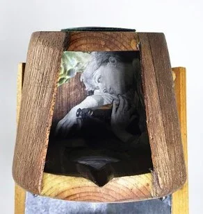 "F.A.B." (top view) by John T. Upchurch and Rebekka Federle (top view), 3" x 4" x 4", Ceramic, wood, antique print material, sheet metal, steel wire, felt, found objects