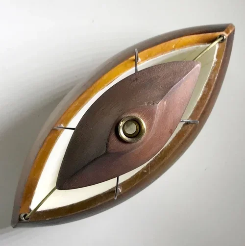 "Loupe" (top view) by John T. Upchurch and Rebekka Federle, 10" x 10" x 4", Antique print material, wood, steel and brass wire, paper, found objects